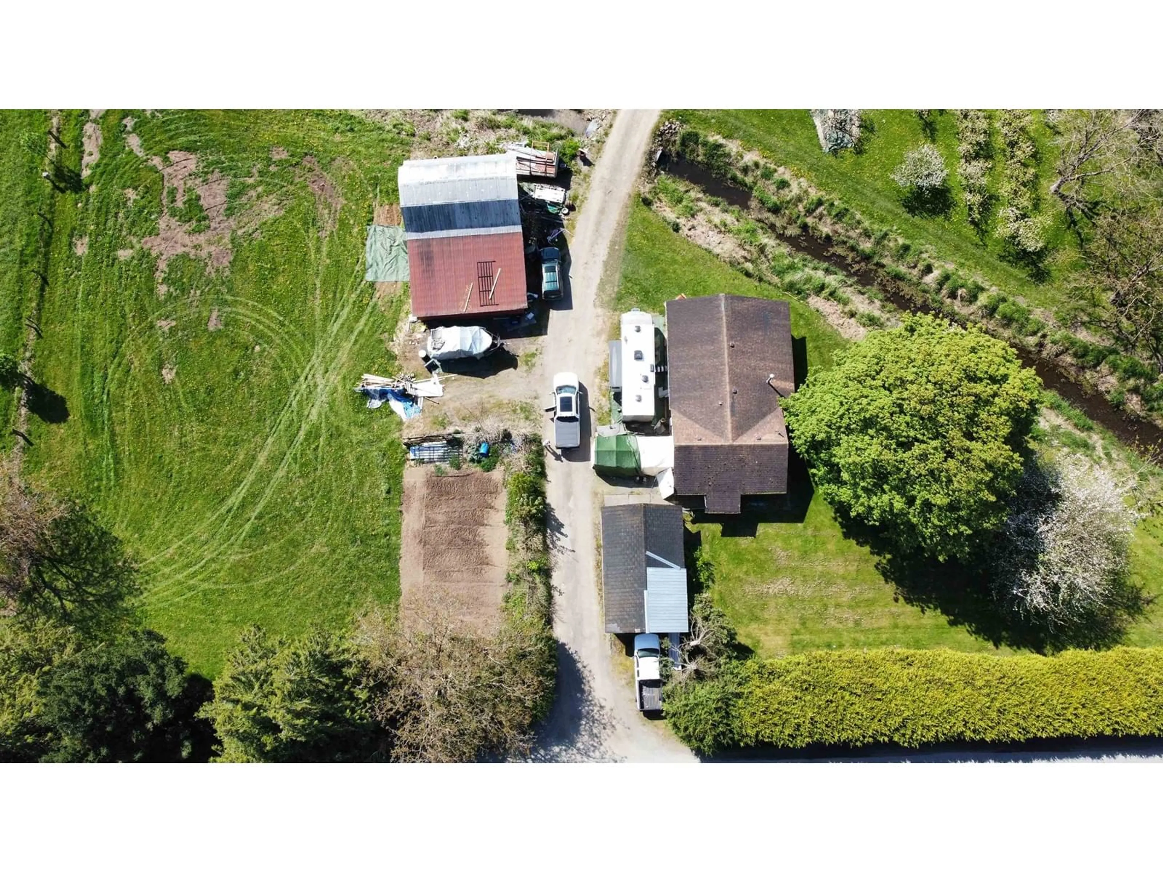 A pic from outside/outdoor area/front of a property/back of a property/a pic from drone, street for 5970 MCCALLUM ROAD, Agassiz British Columbia V0M1A3
