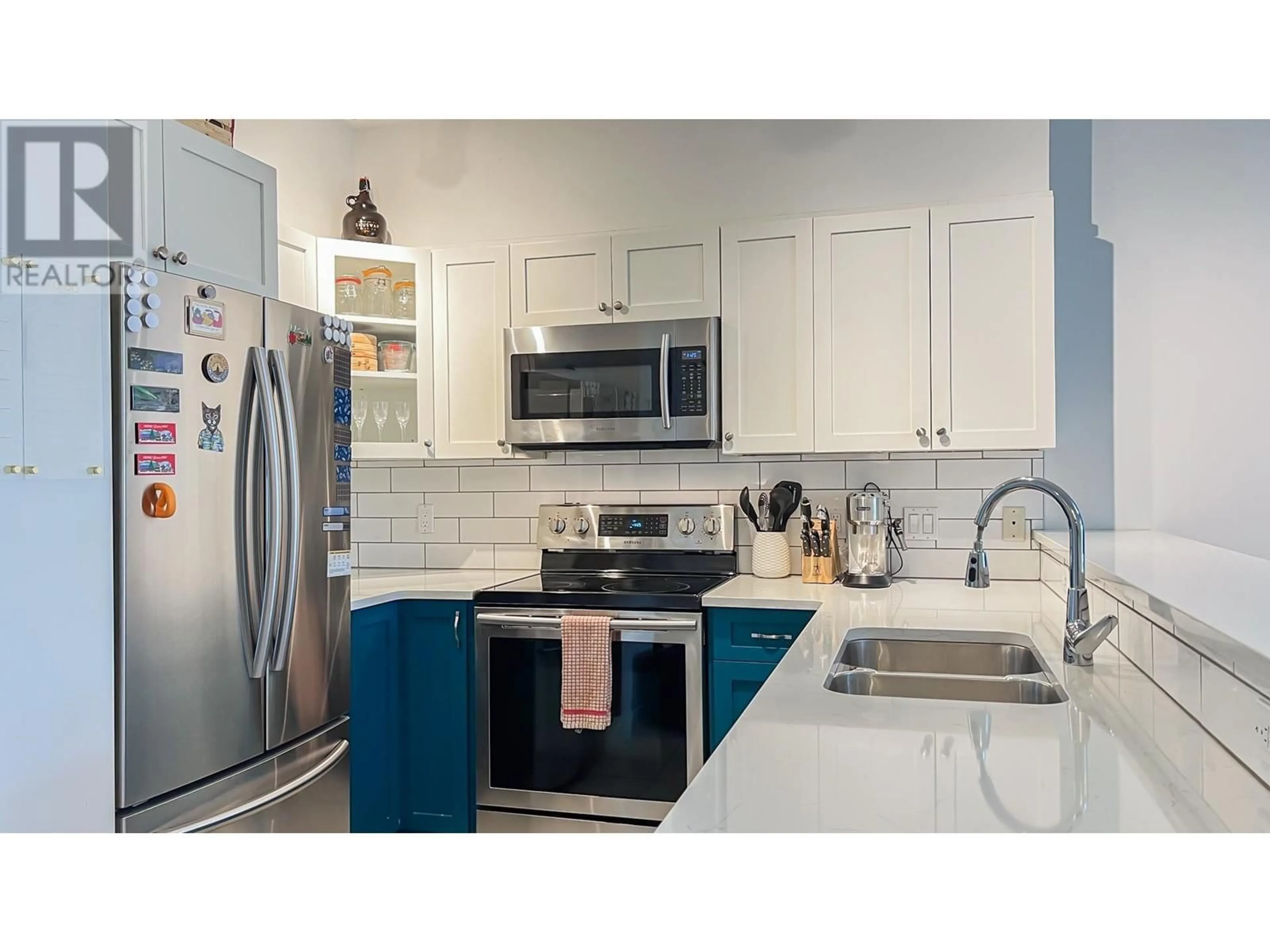 Open concept kitchen, ceramic/tile floor for 404 - 2755 MAPLE STREET, Vancouver British Columbia V6J5K1