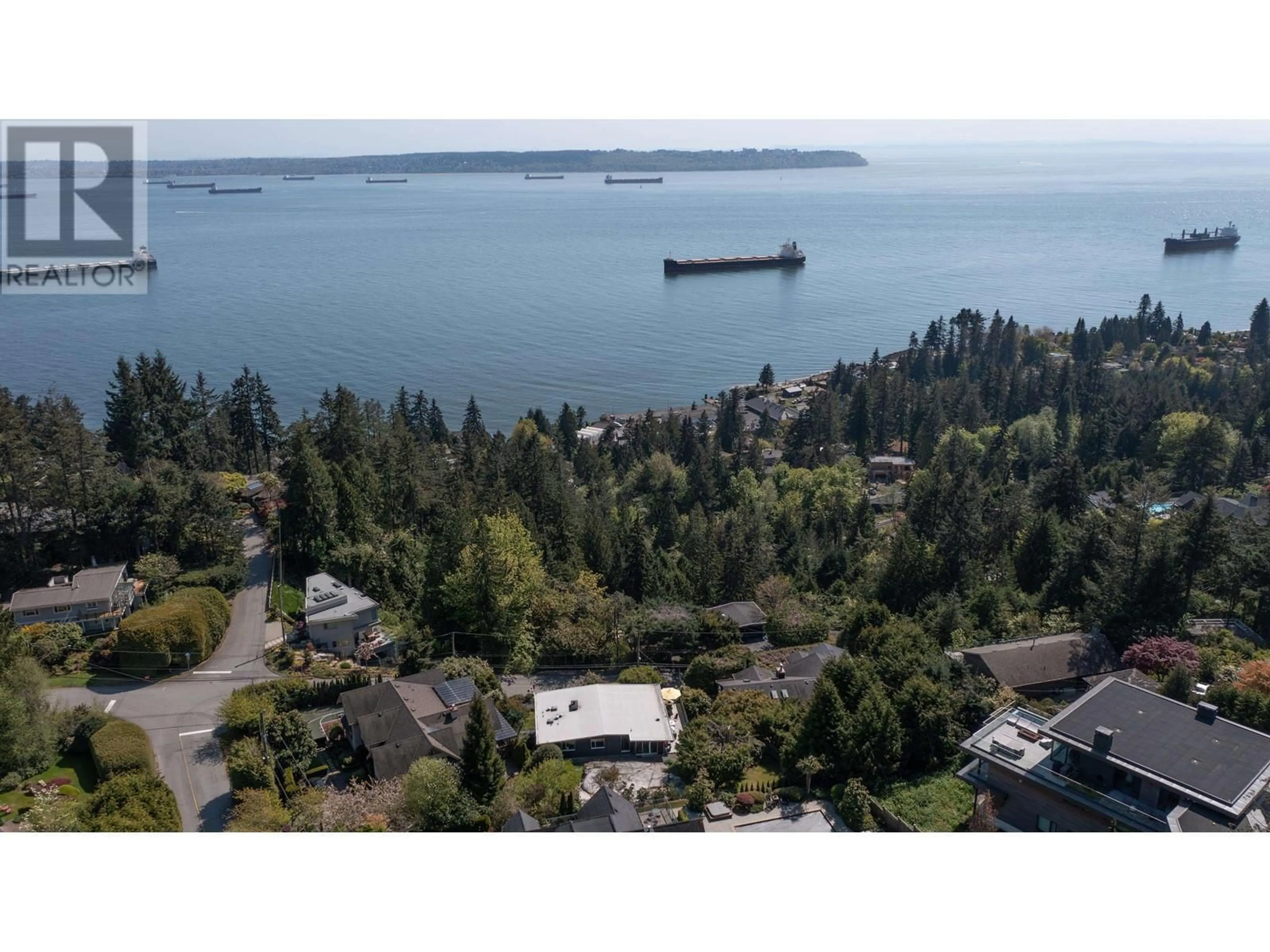 A pic from outside/outdoor area/front of a property/back of a property/a pic from drone, water/lake/river/ocean view for 4045 BAYRIDGE AVENUE, West Vancouver British Columbia V7V3J9