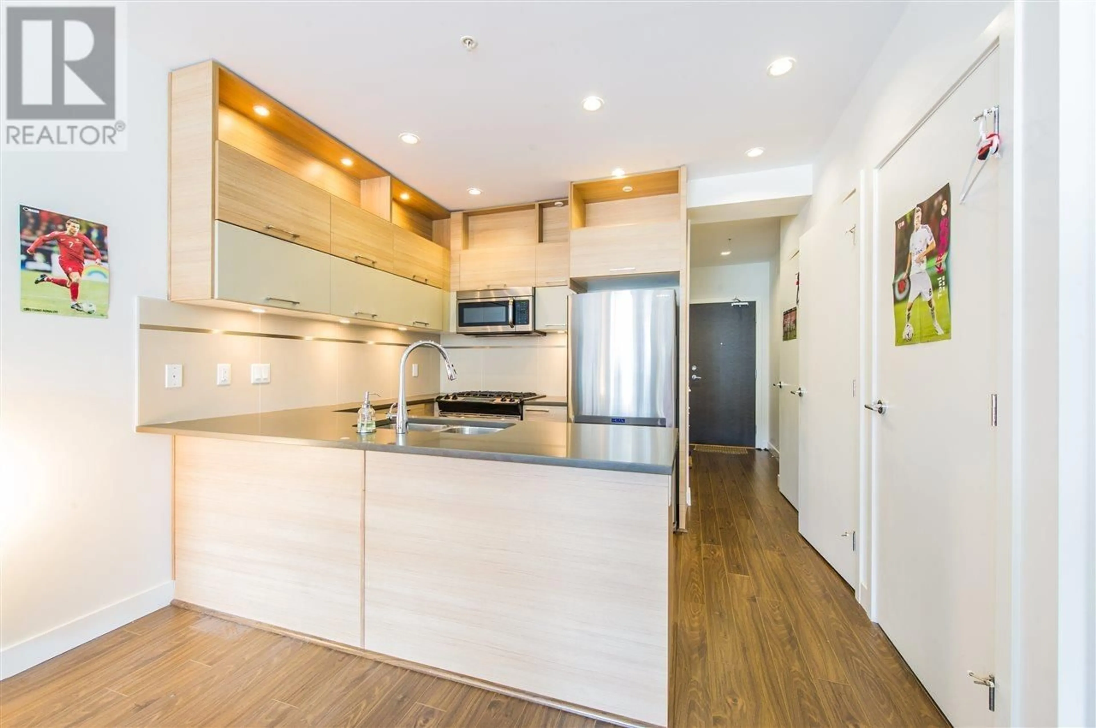 Open concept kitchen, unknown for 203 - 9150 UNIVERSITY HIGH STREET, Burnaby British Columbia V5A0C5