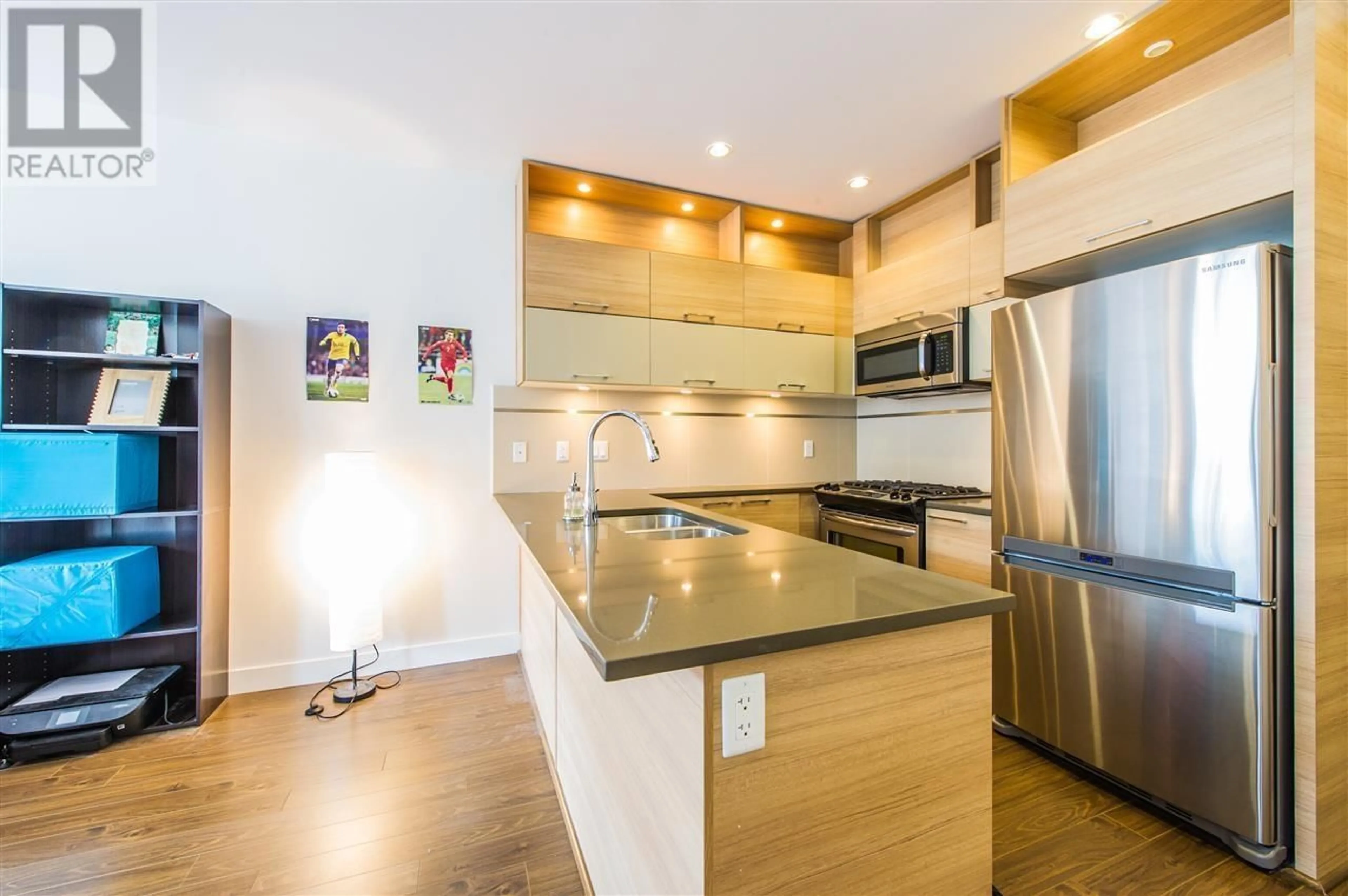 Open concept kitchen, unknown for 203 - 9150 UNIVERSITY HIGH STREET, Burnaby British Columbia V5A0C5