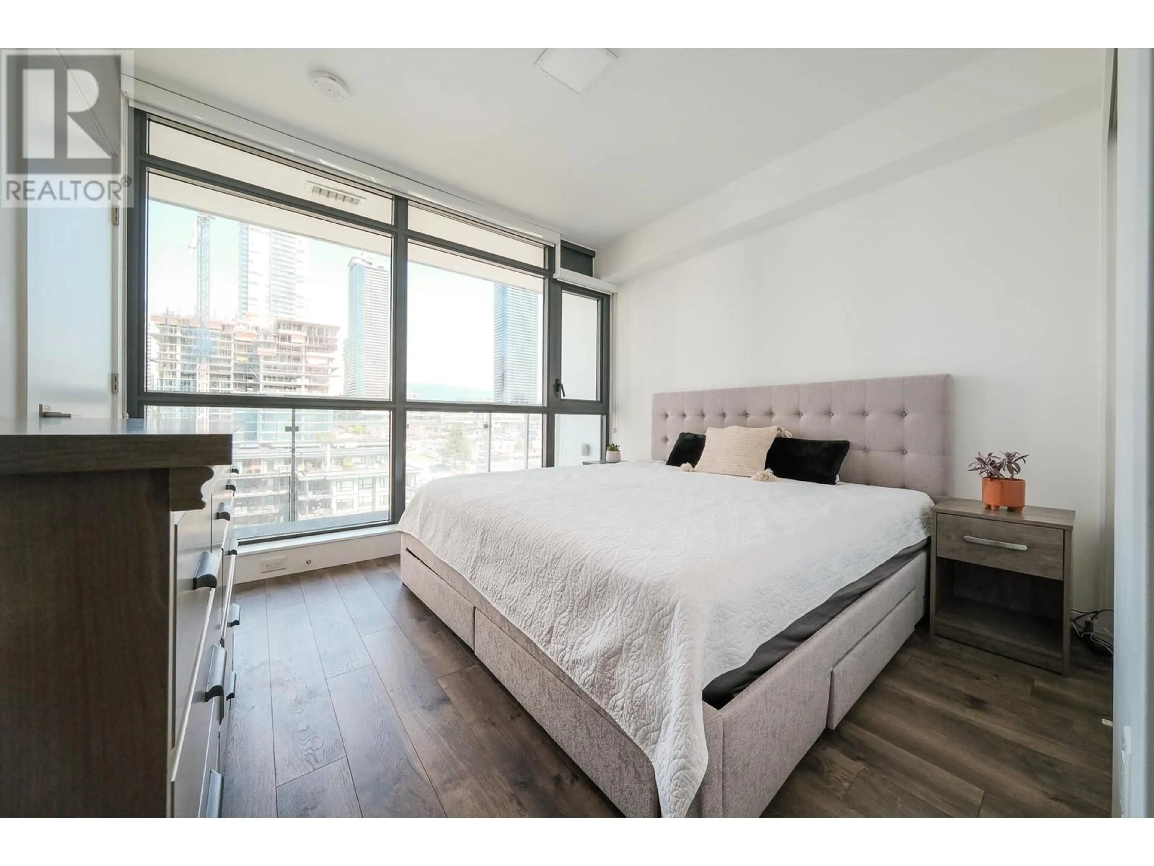 Bedroom with bed, wood/laminate floor for 1101 - 4488 JUNEAU STREET, Burnaby British Columbia V5C0M4