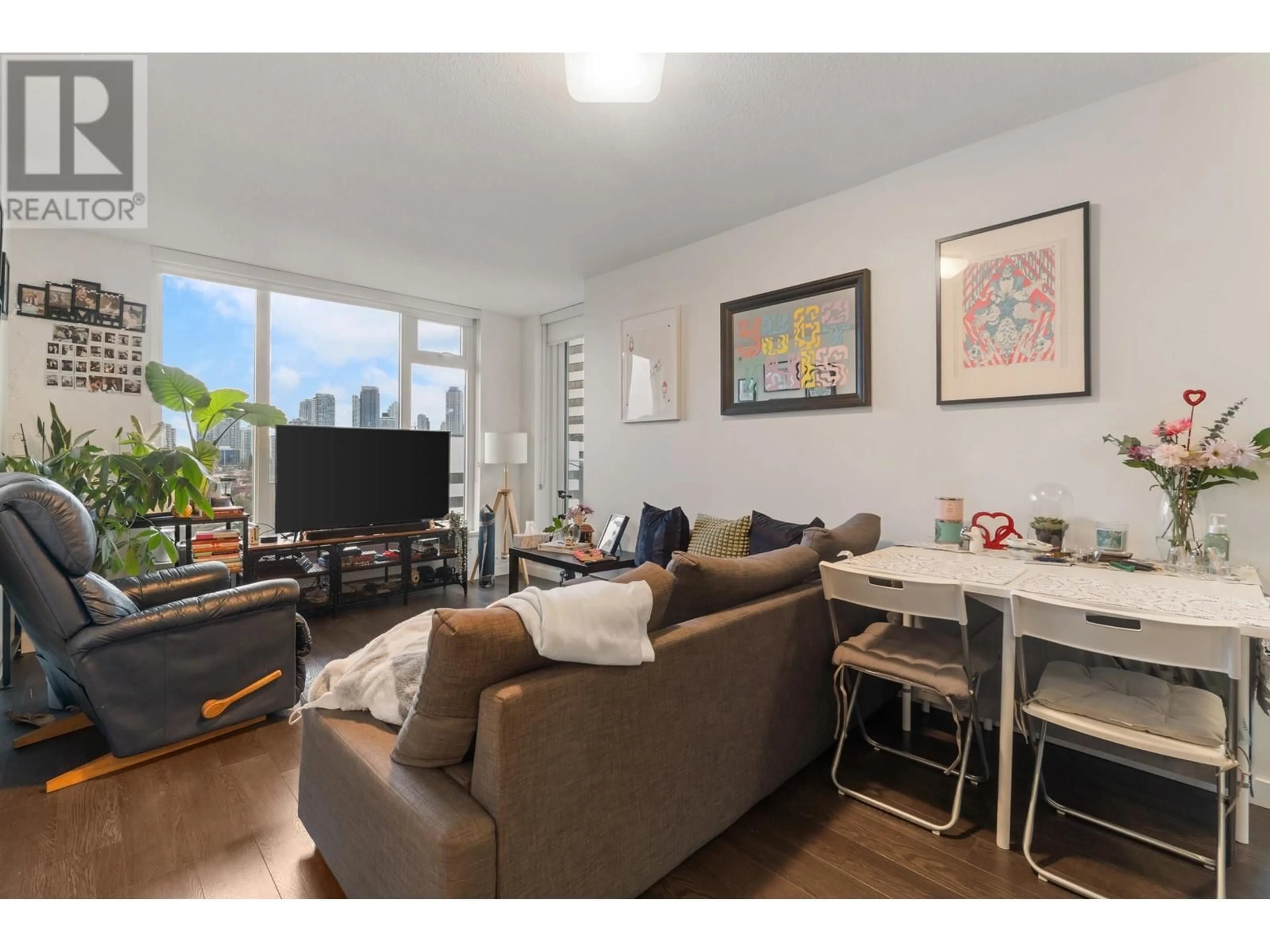 Living room with furniture, wood/laminate floor for 1807 - 5515 BOUNDARY ROAD, Vancouver British Columbia V5R0E3