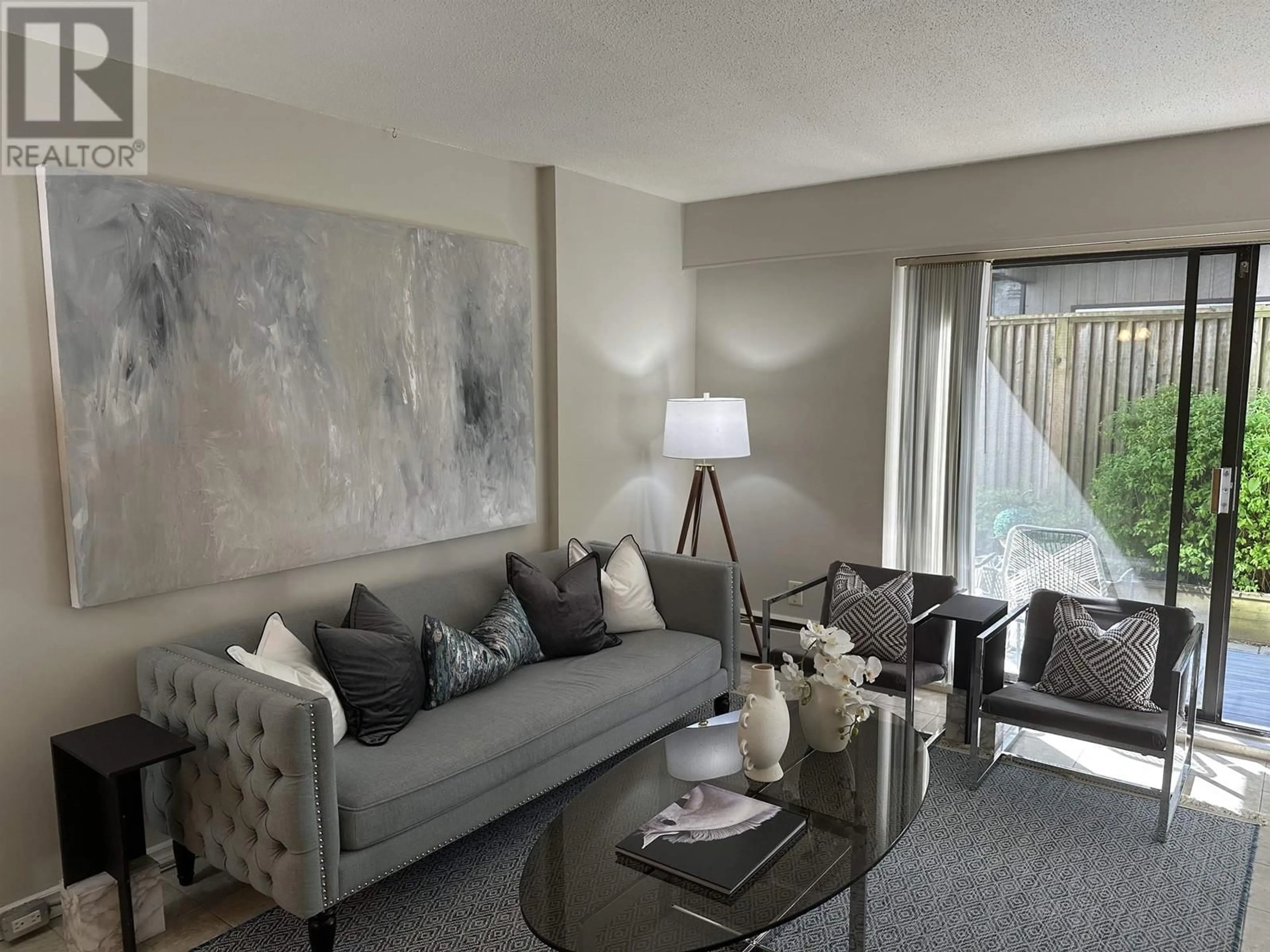 Living room with furniture, unknown for 103 - 2040 CORNWALL AVENUE, Vancouver British Columbia V6J1E1