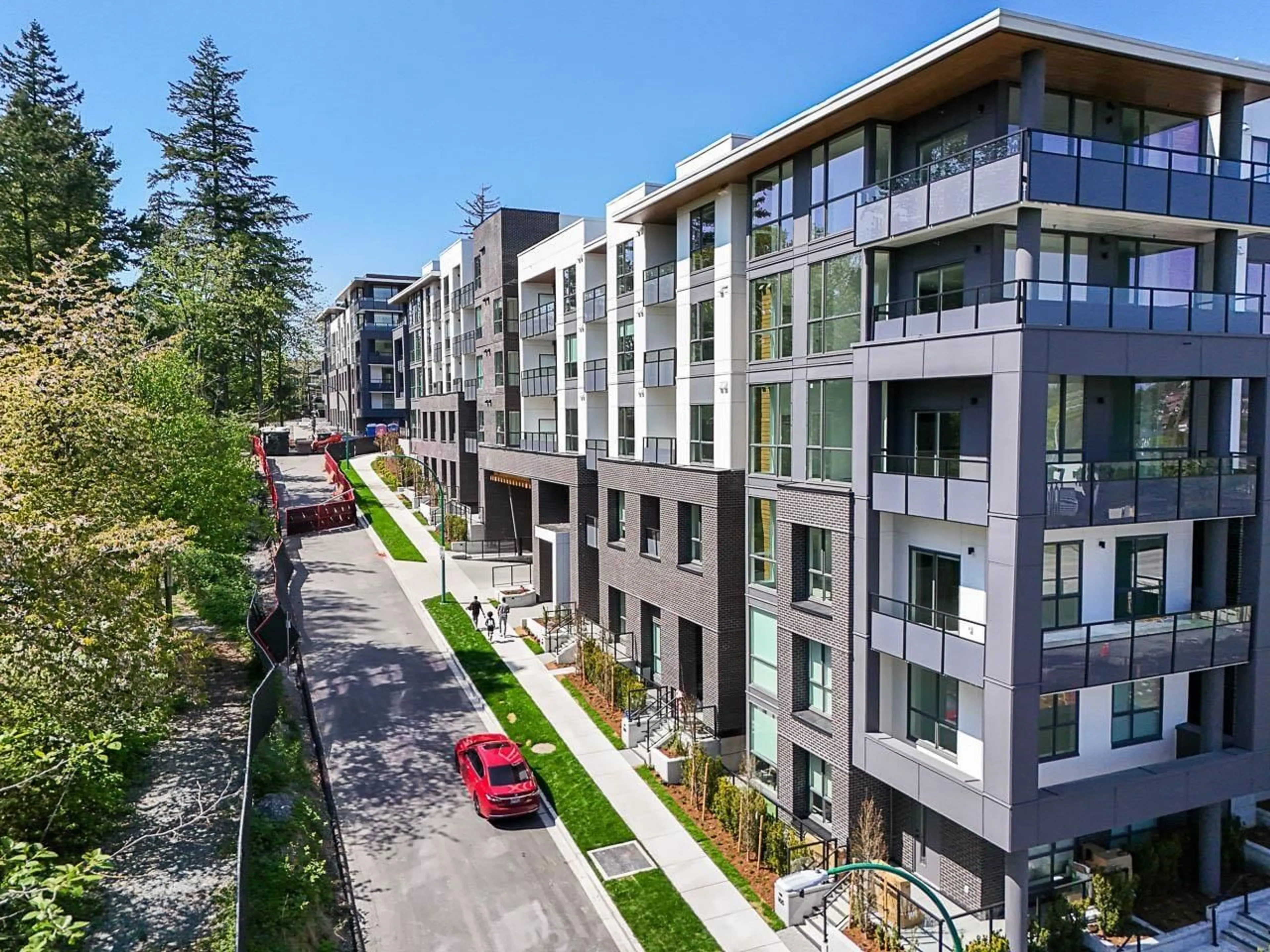 A pic from outside/outdoor area/front of a property/back of a property/a pic from drone, street for 313 - 19577 65B, Surrey British Columbia V4N6Y3