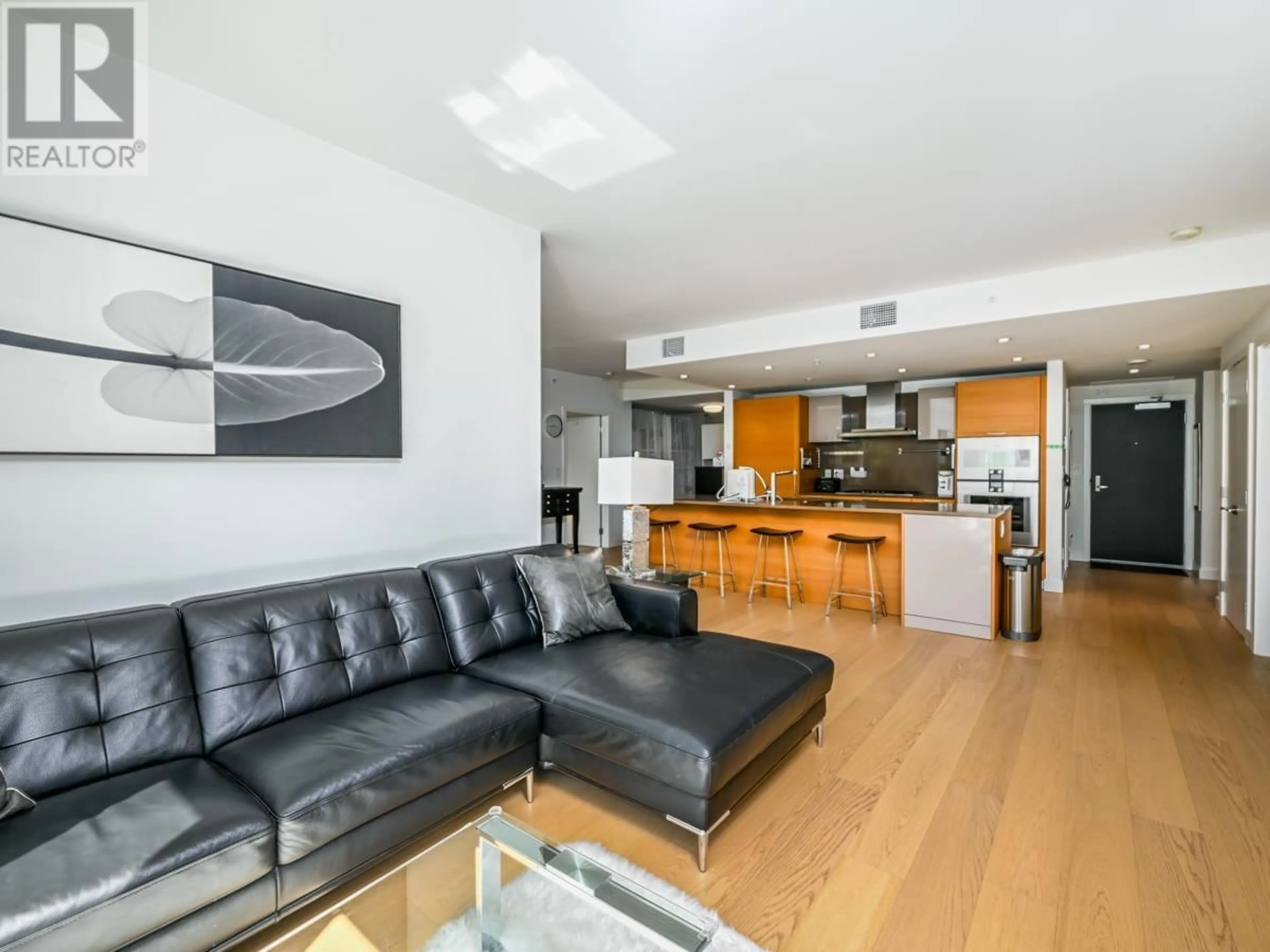 Living room with furniture, unknown for 204 - 7128 ADERA STREET, Vancouver British Columbia V6Z3G1