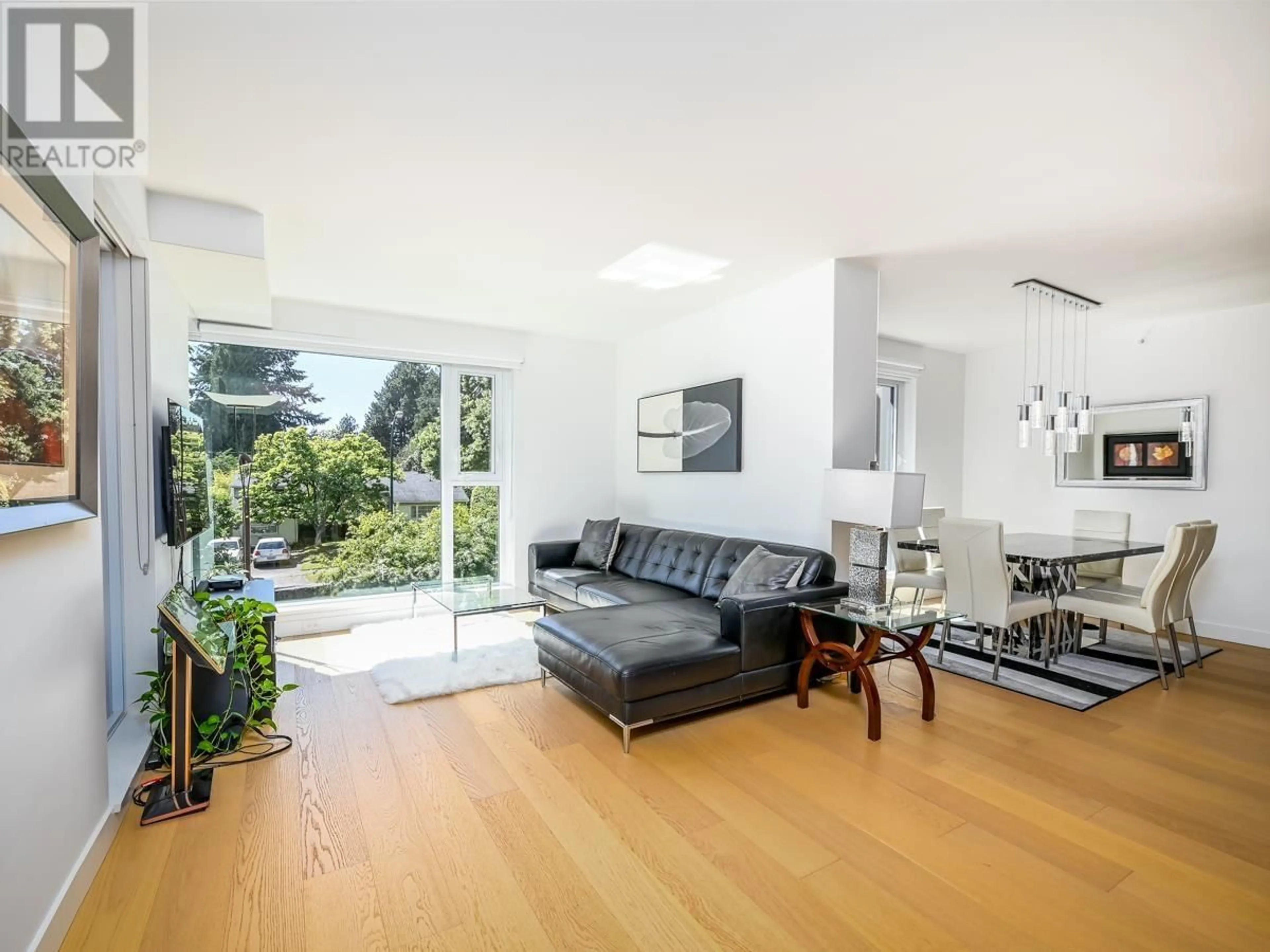 Living room with furniture, unknown for 204 - 7128 ADERA STREET, Vancouver British Columbia V6Z3G1