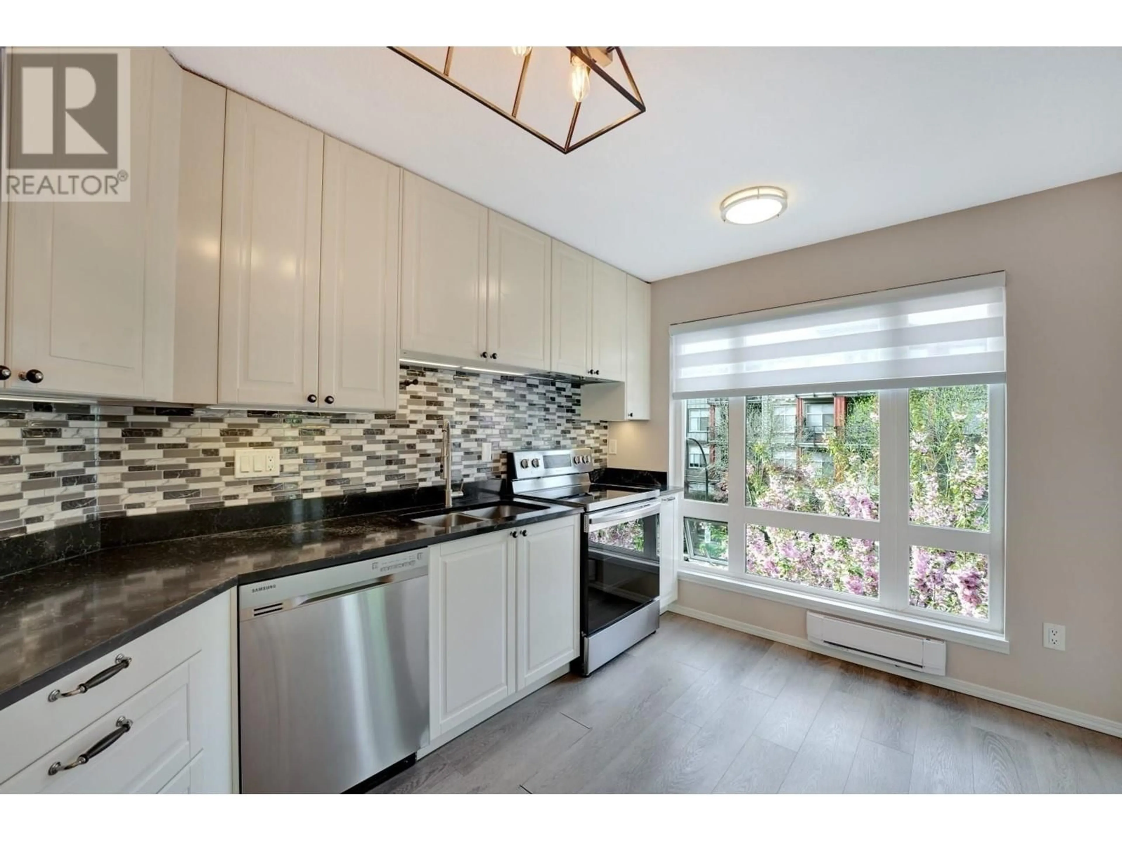Open concept kitchen, ceramic/tile floor for 301 - 2335 WHYTE AVENUE, Port Coquitlam British Columbia V3C2A3