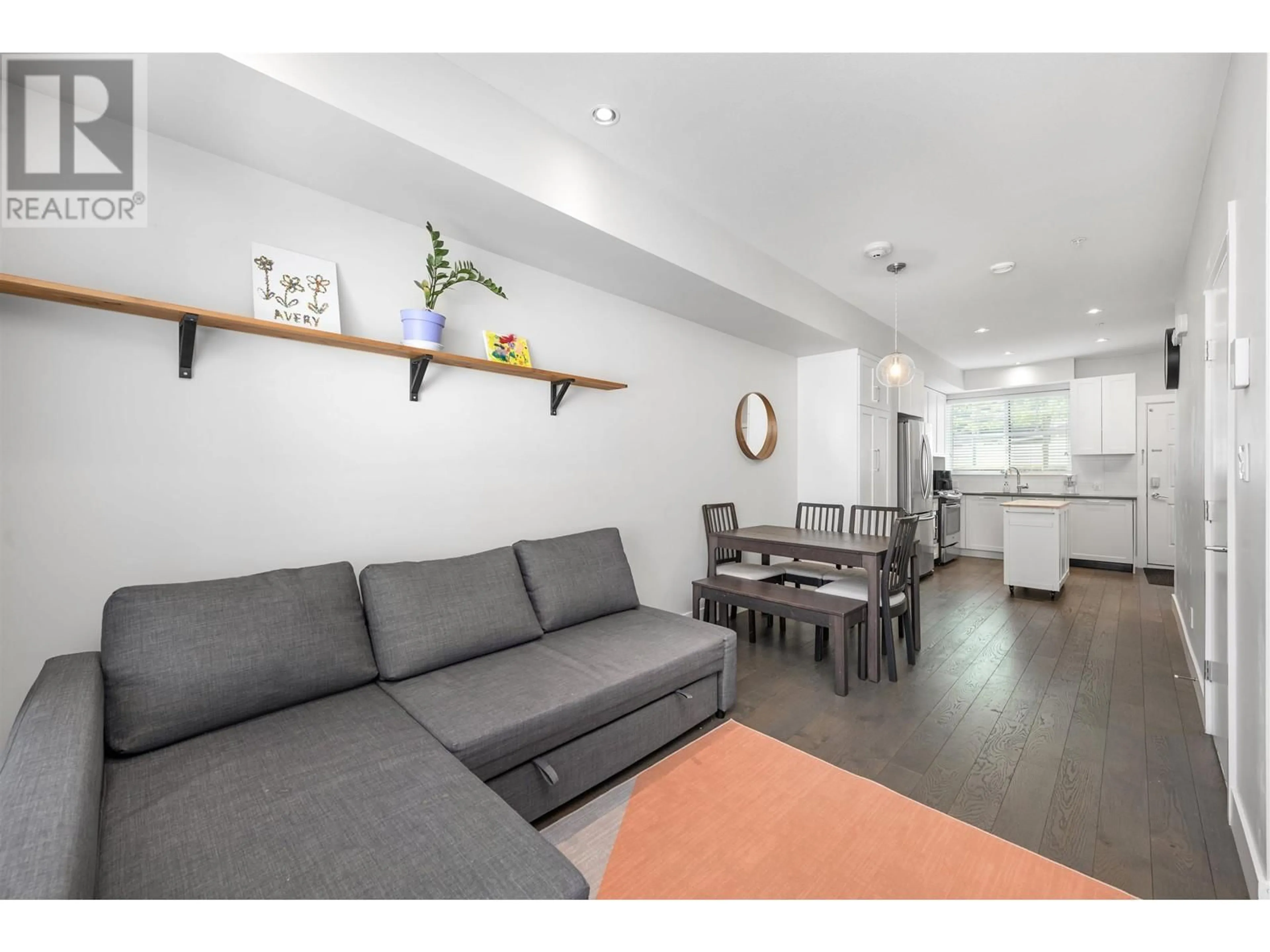 Living room with furniture, wood/laminate floor for 7 - 5152 CANADA WAY, Burnaby British Columbia V5E0C3