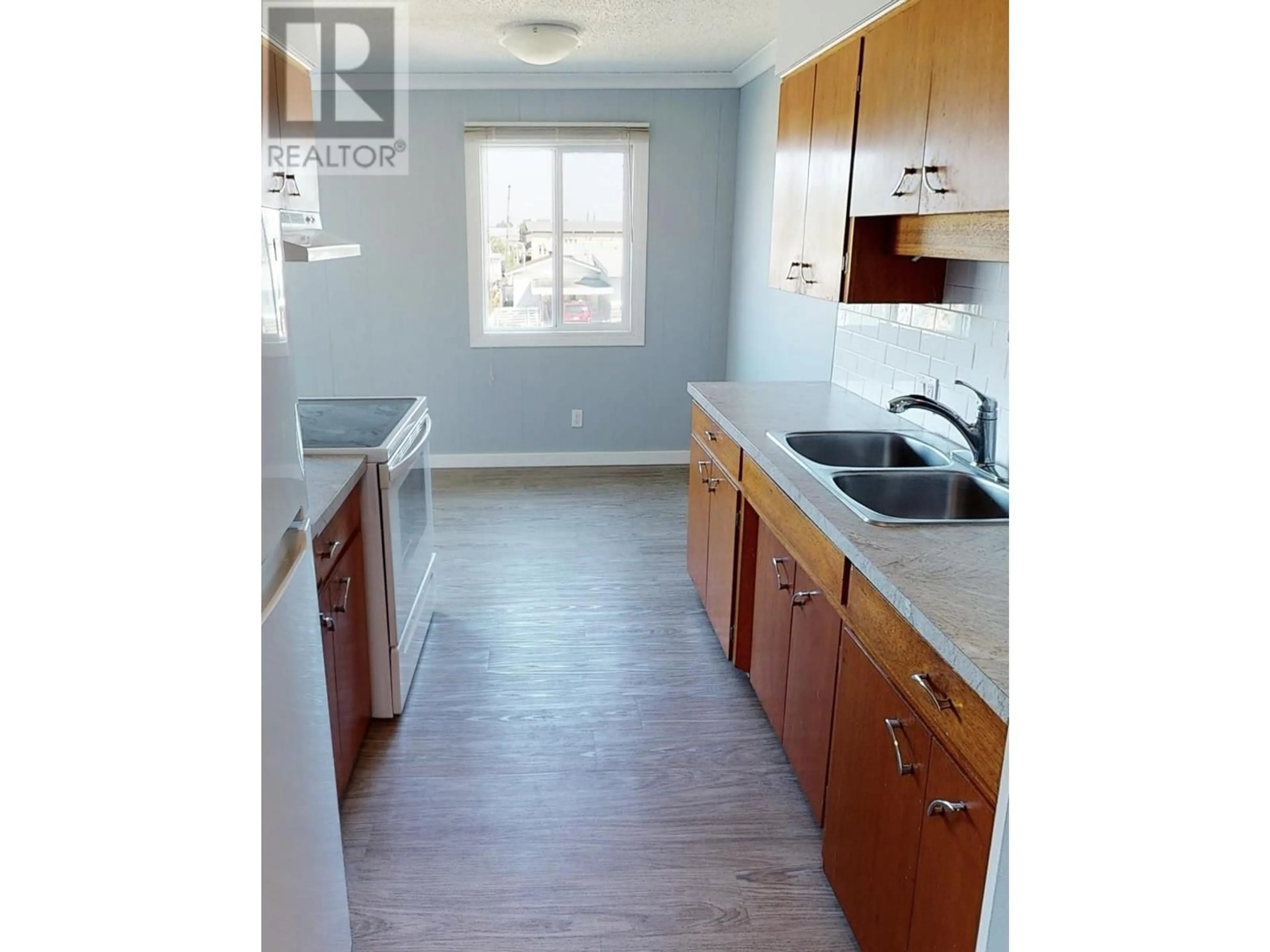 Standard kitchen, wood/laminate floor for 111 - 9807 104 AVENUE, Fort St. John British Columbia V1J2K4