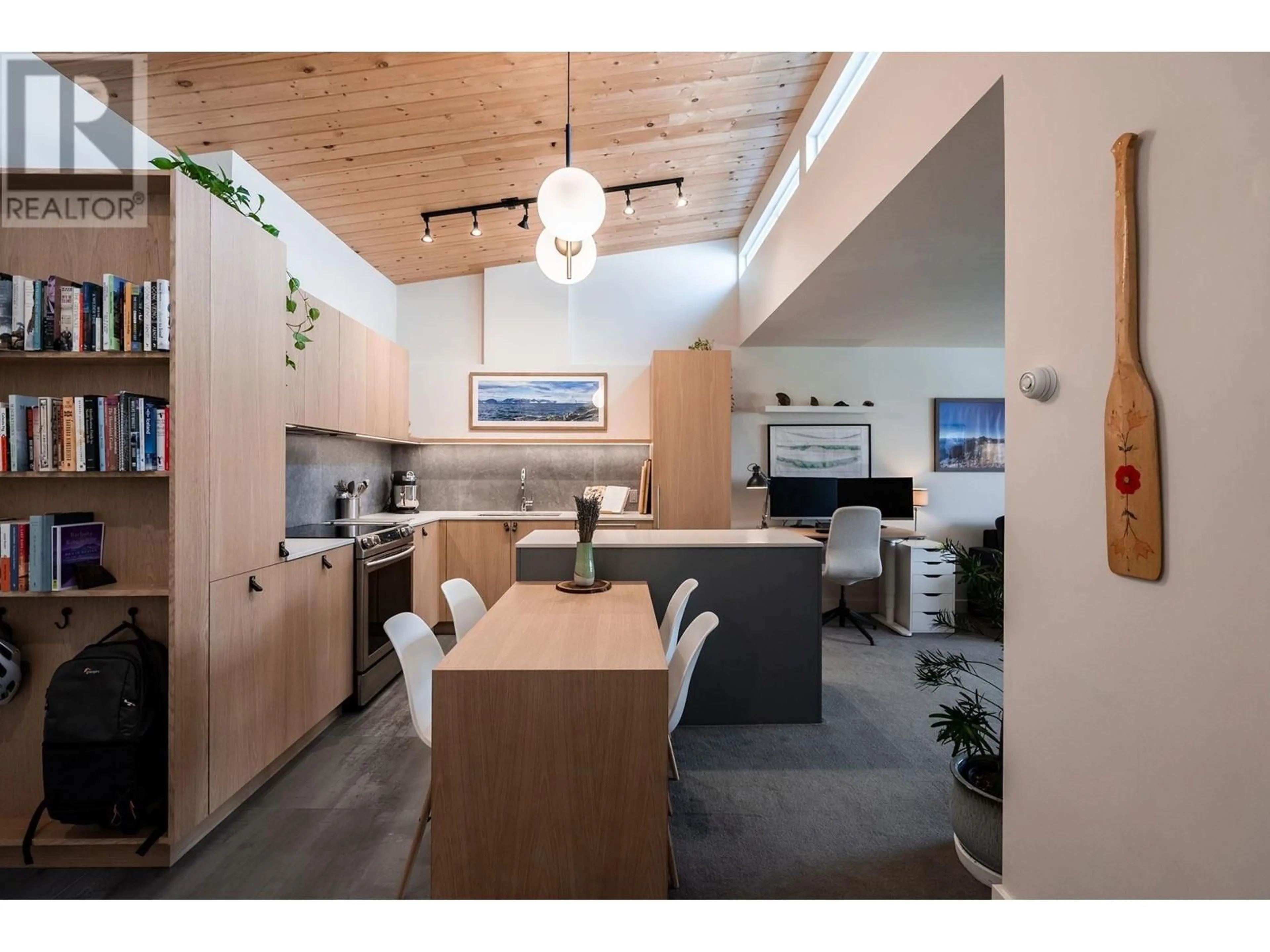 Open concept kitchen, wood/laminate floor for 301 - 2416 3RD AVENUE, Vancouver British Columbia V6K1L8