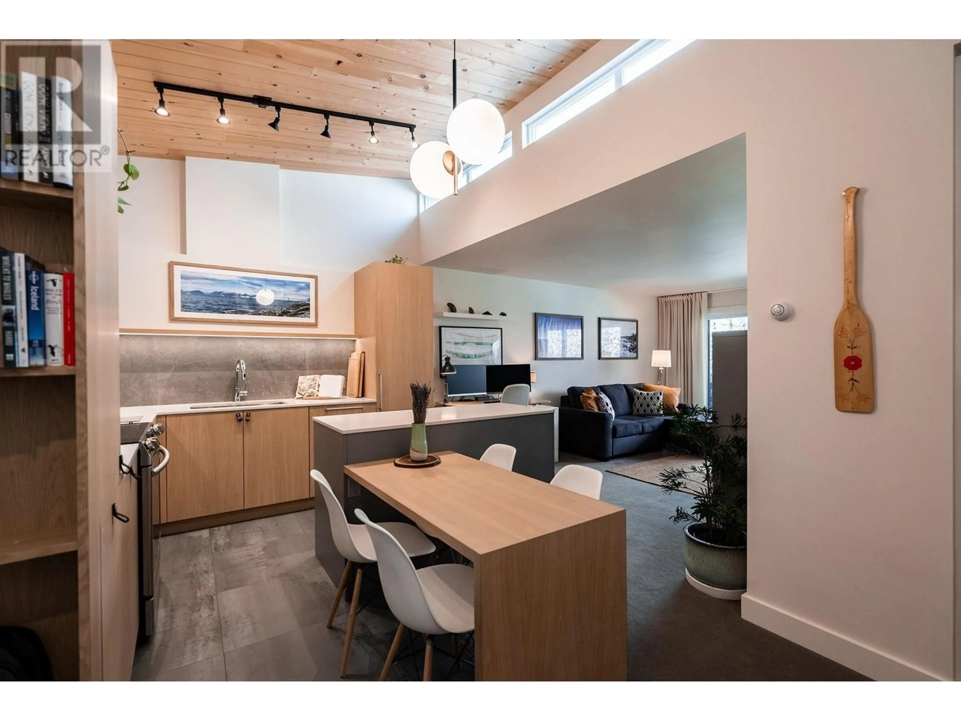 Open concept kitchen, wood/laminate floor for 301 - 2416 3RD AVENUE, Vancouver British Columbia V6K1L8