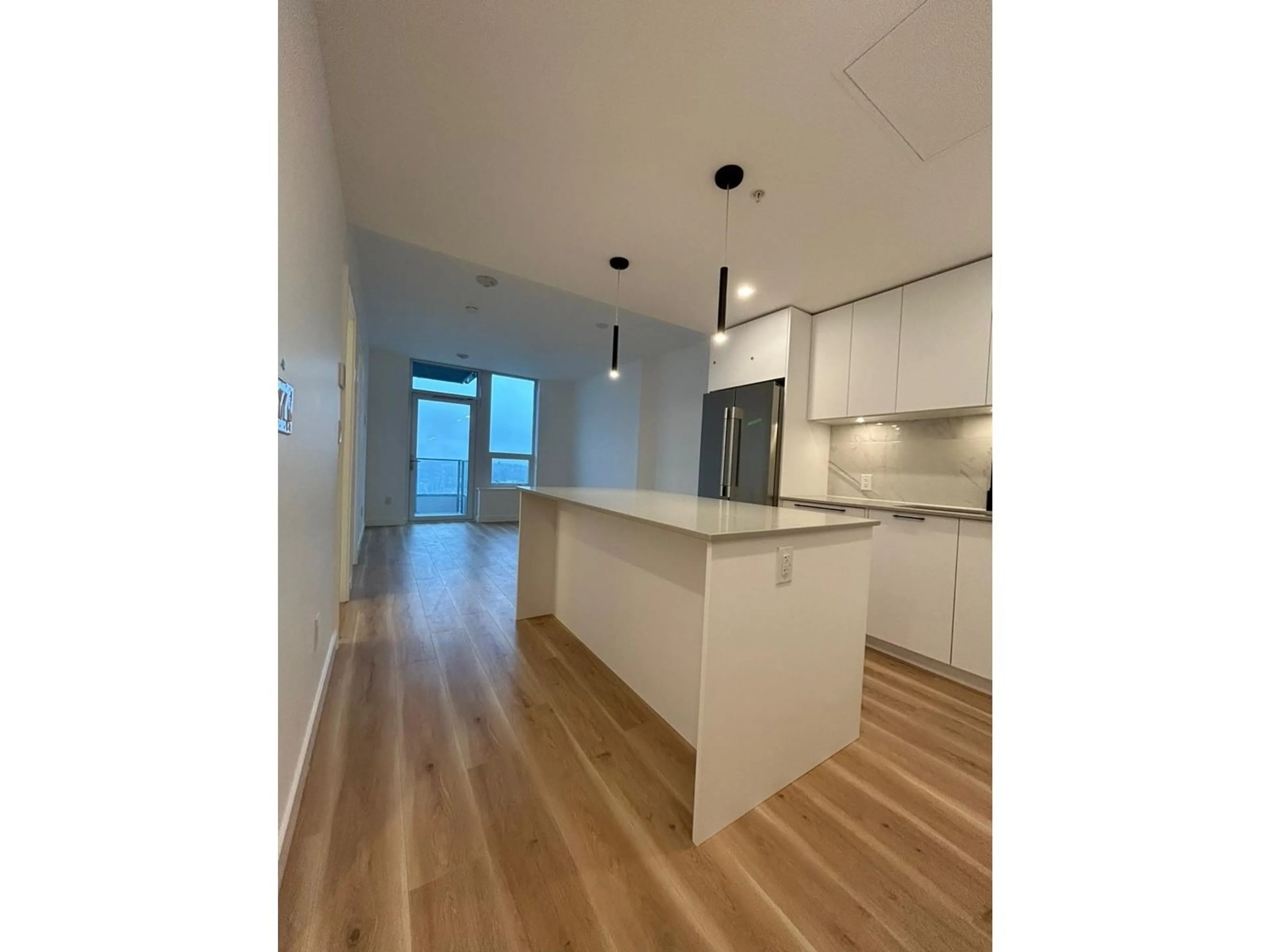 Open concept kitchen, wood/laminate floor for 2503 - 8551 201, Langley British Columbia V2Y3Y5