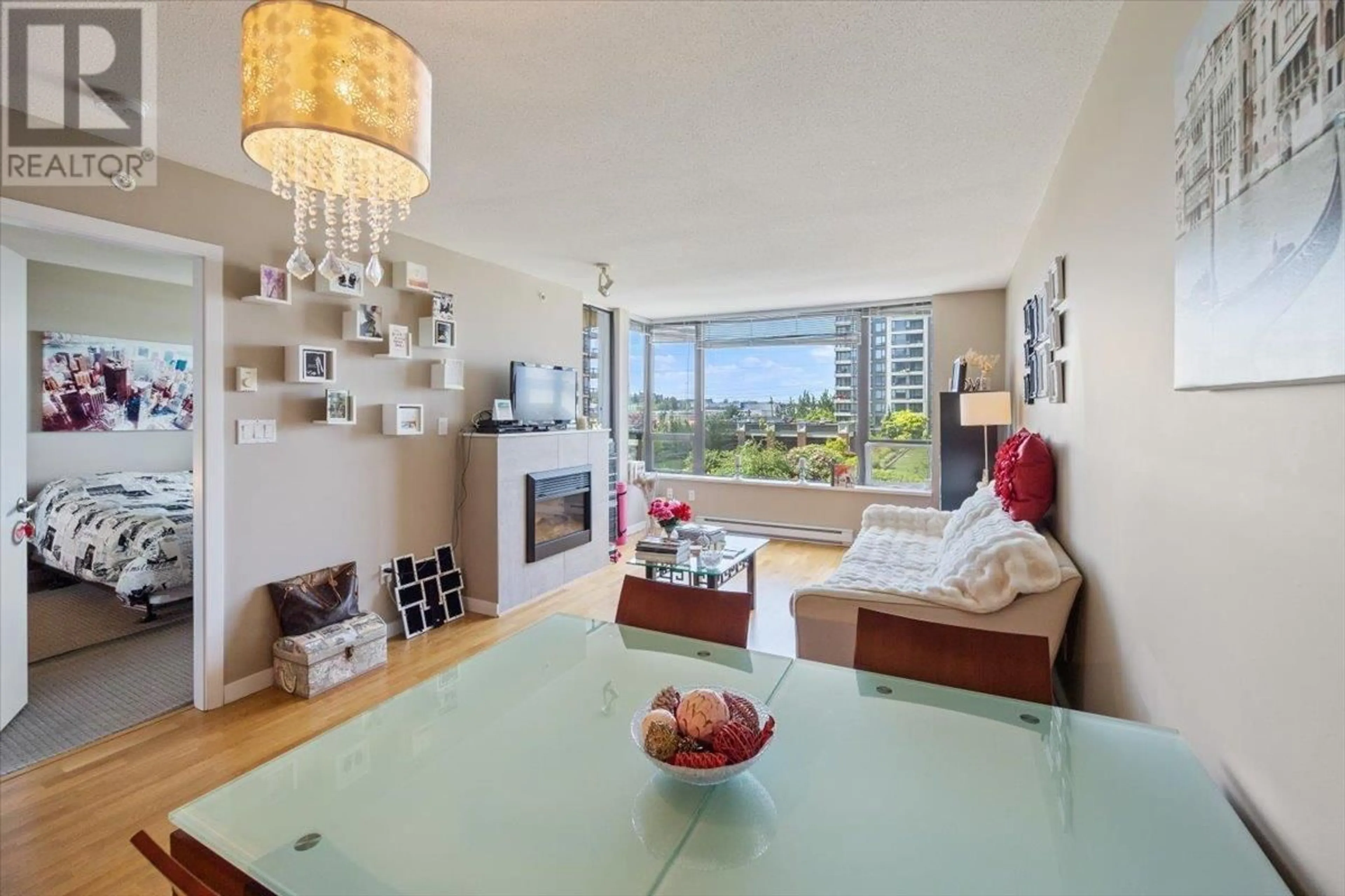 Living room with furniture, wood/laminate floor for 505 - 4182 DAWSON STREET, Burnaby British Columbia V5C0A2