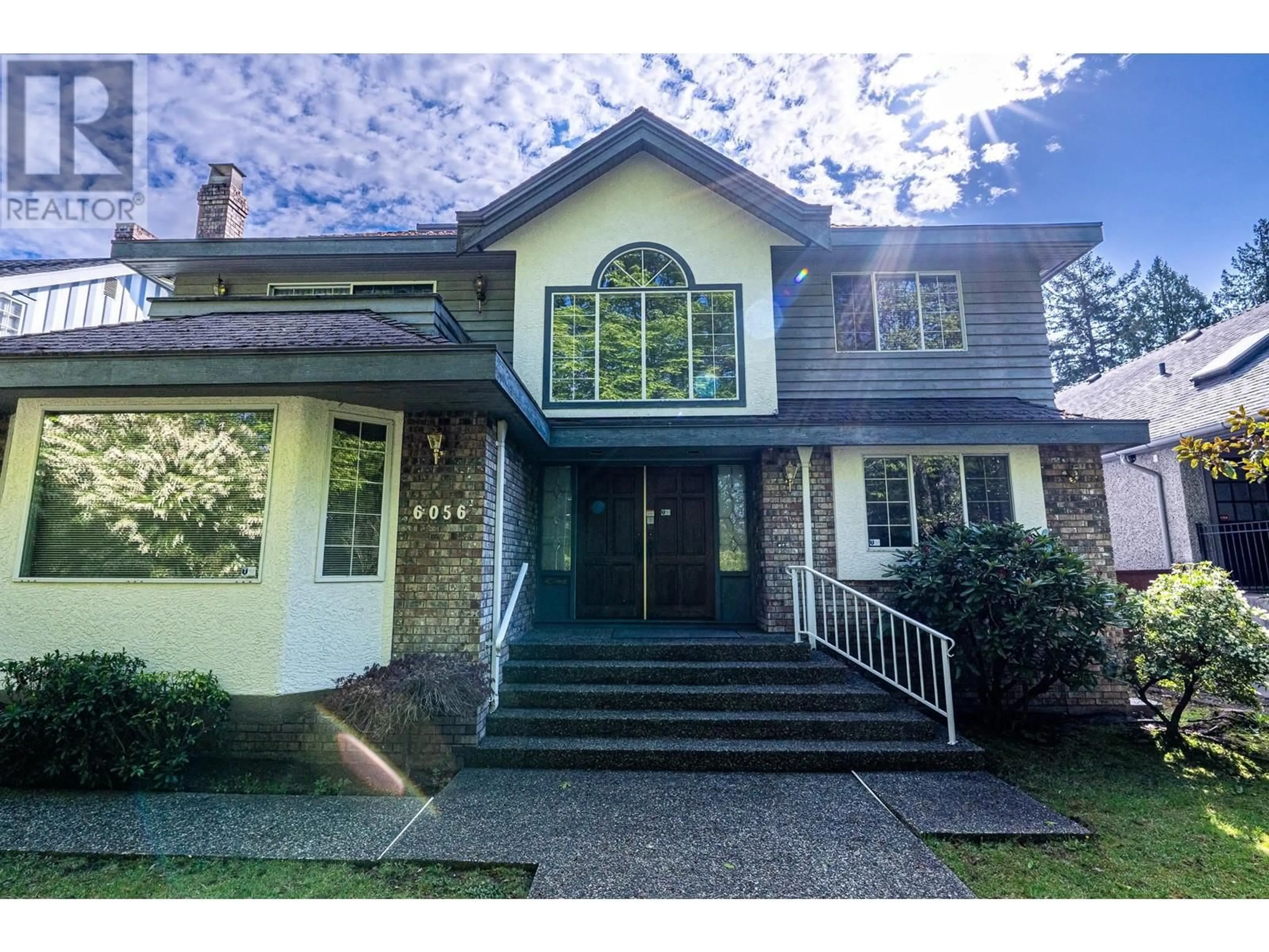 Home with vinyl exterior material, street for 6056 TRAFALGAR STREET, Vancouver British Columbia V6N1C4