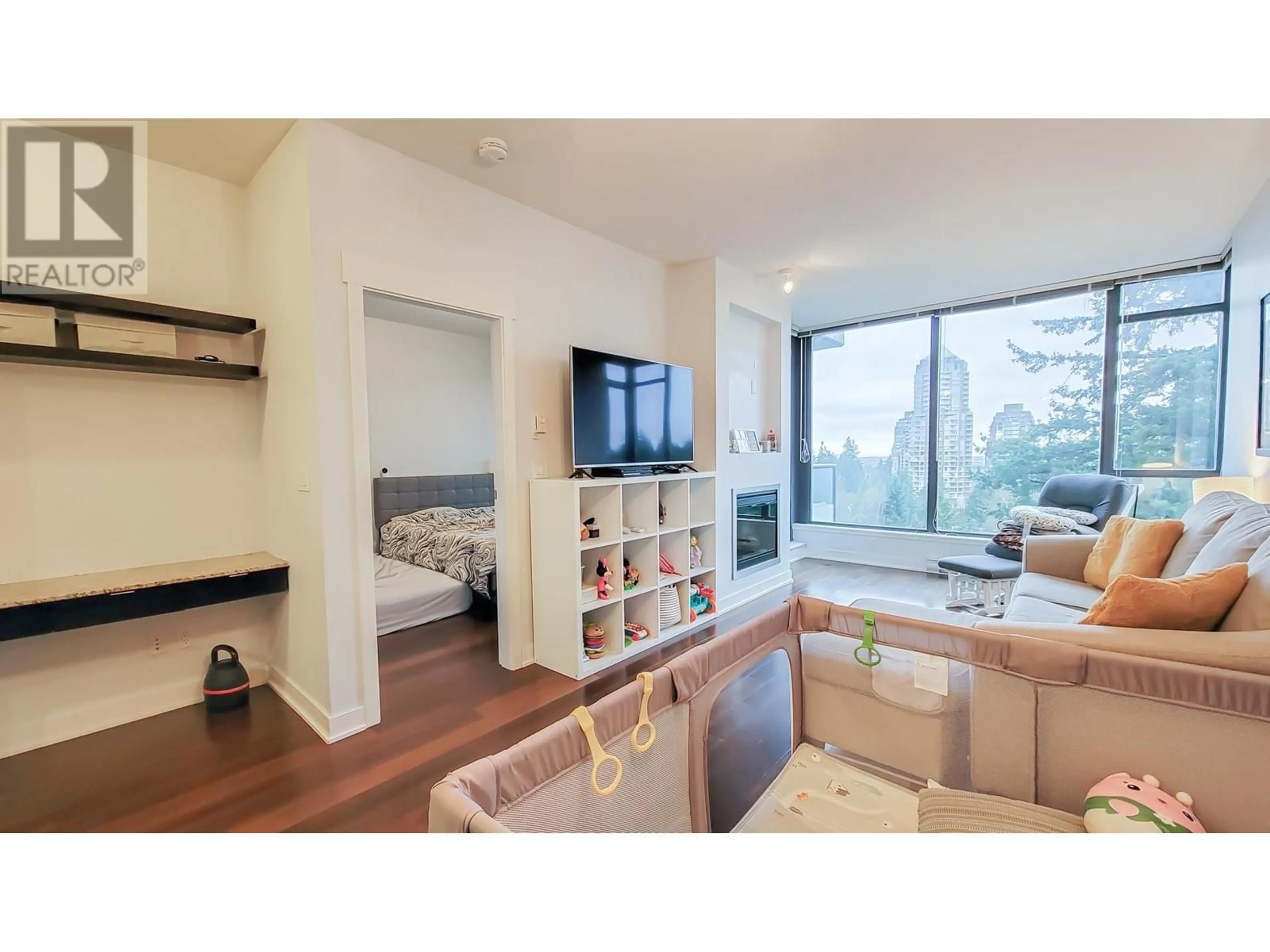 Living room with furniture, wood/laminate floor for 1501 - 7088 18TH AVENUE, Burnaby British Columbia V3N0A2