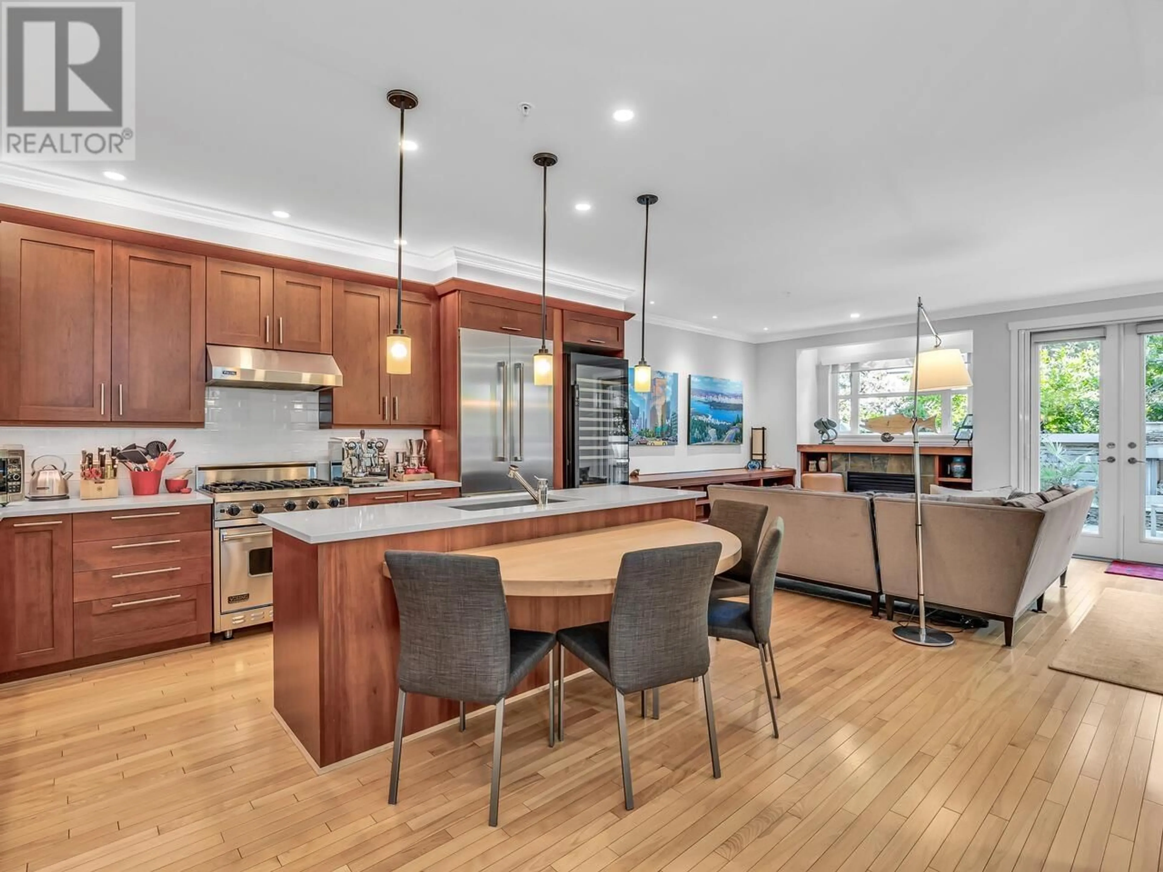 Open concept kitchen, wood/laminate floor for 4658 CAPILANO ROAD, North Vancouver British Columbia V7R4K3