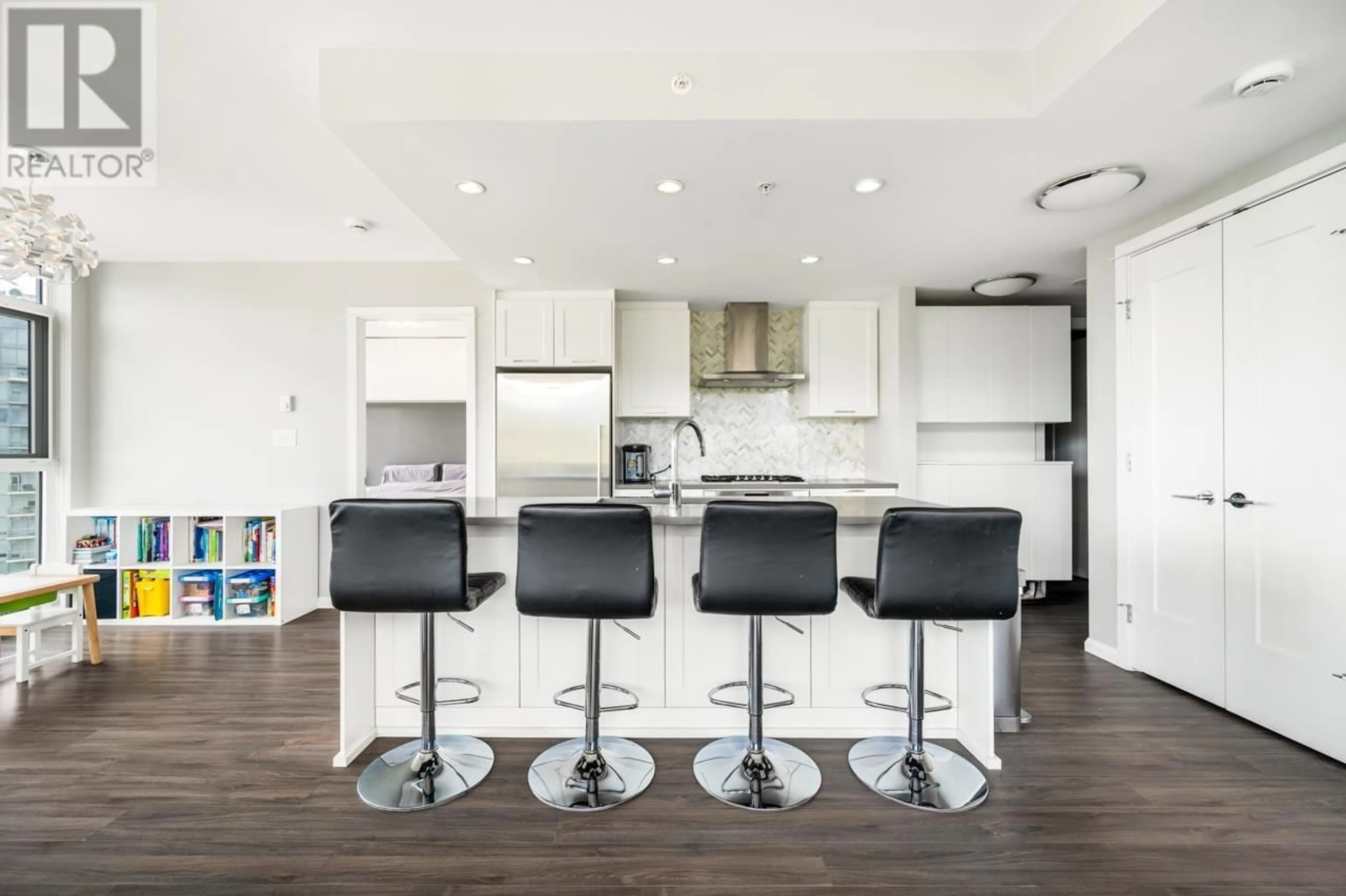 Open concept kitchen, wood/laminate floor for 1305 - 520 COMO LAKE AVENUE, Coquitlam British Columbia V3J0E8