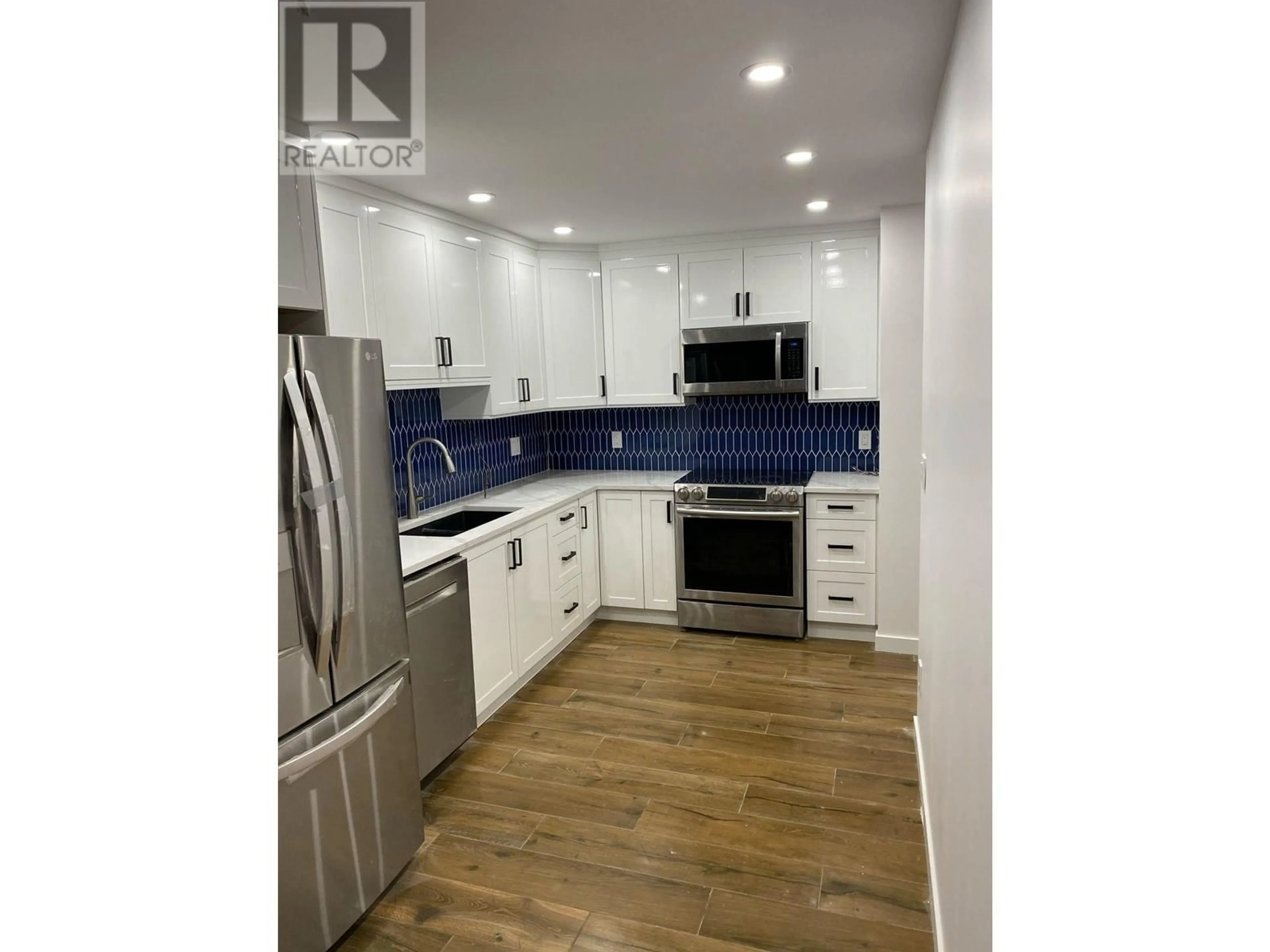Open concept kitchen, unknown for 406 - 1515 BROADWAY, Vancouver British Columbia V5N1V9