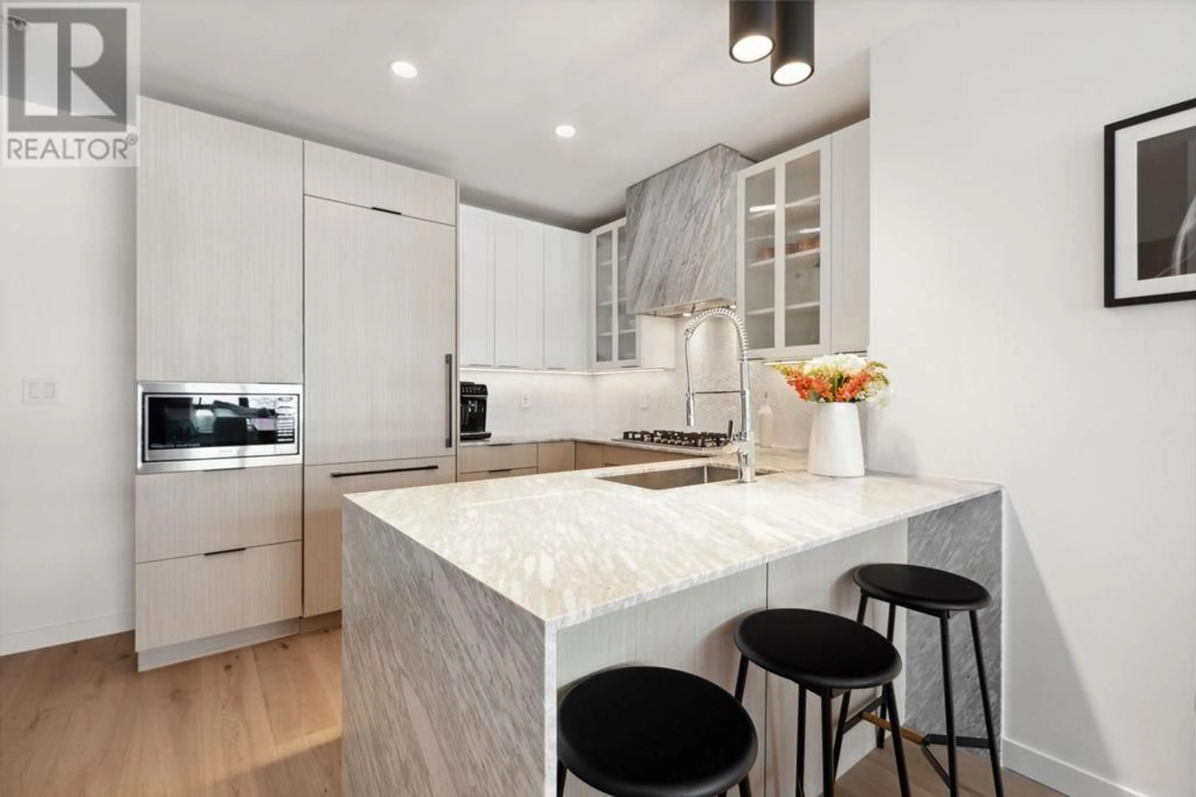 Contemporary kitchen, ceramic/tile floor for 608 - 170 1ST STREET, North Vancouver British Columbia V7M3P2