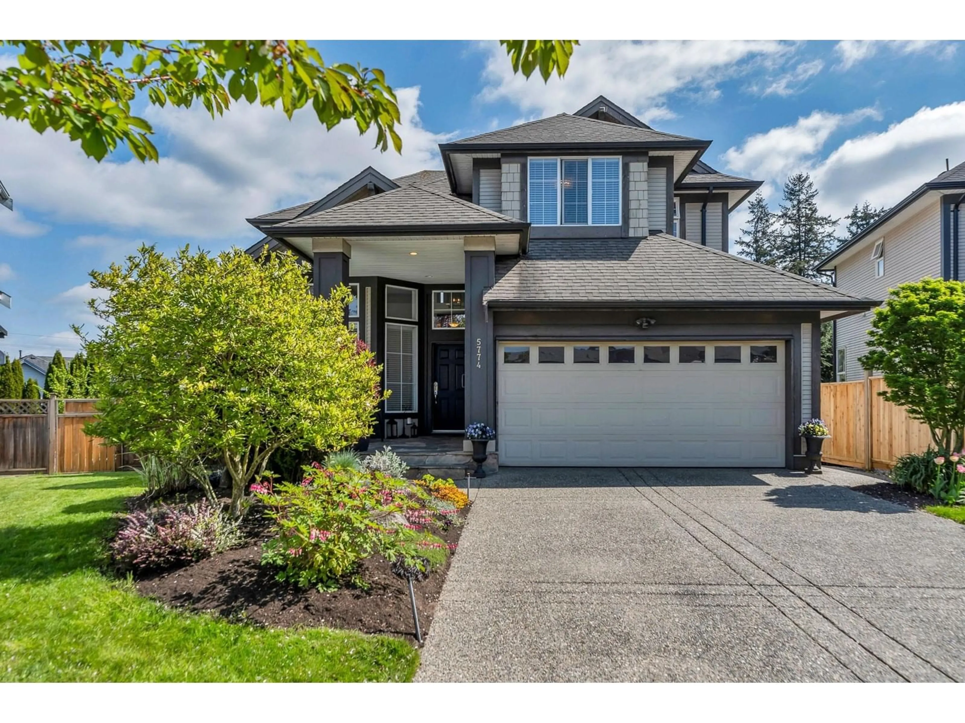 Home with vinyl exterior material, street for 5774 147A, Surrey British Columbia V3S1S2