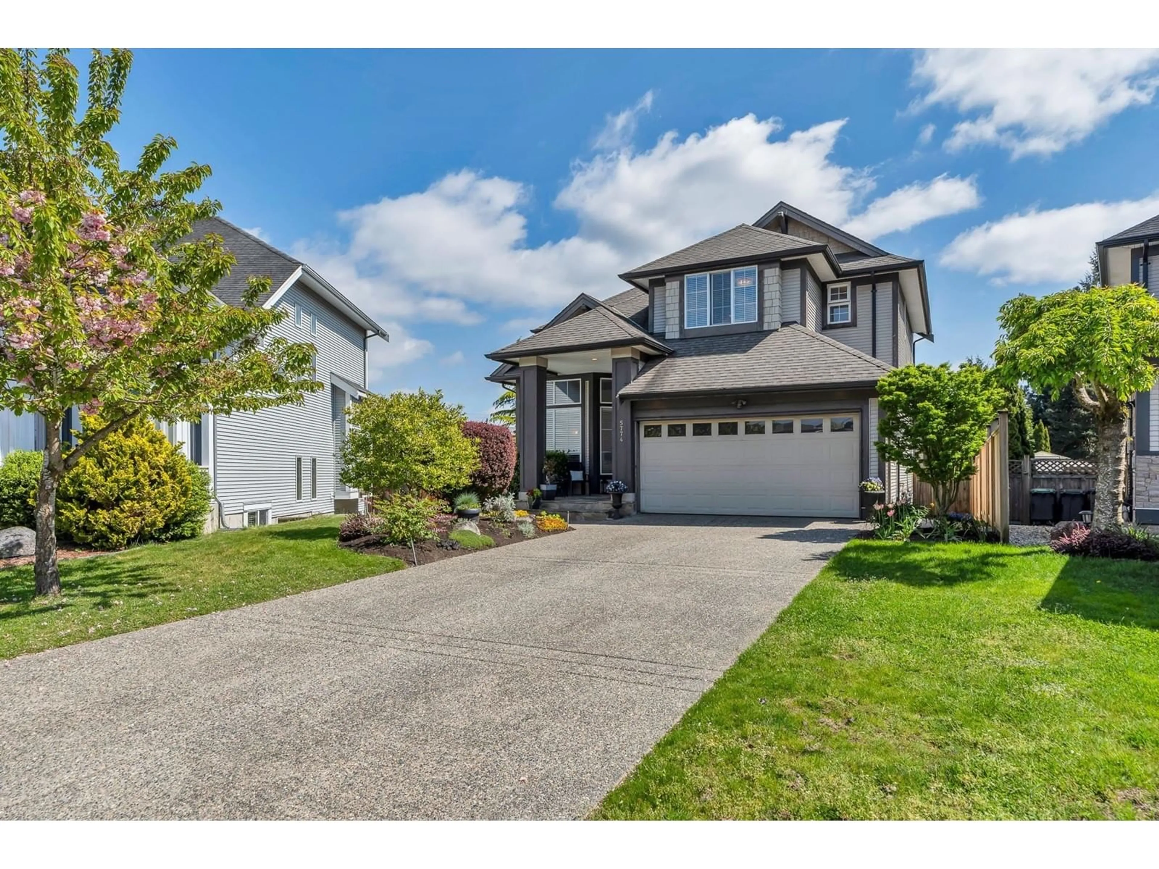 Home with vinyl exterior material, street for 5774 147A, Surrey British Columbia V3S1S2