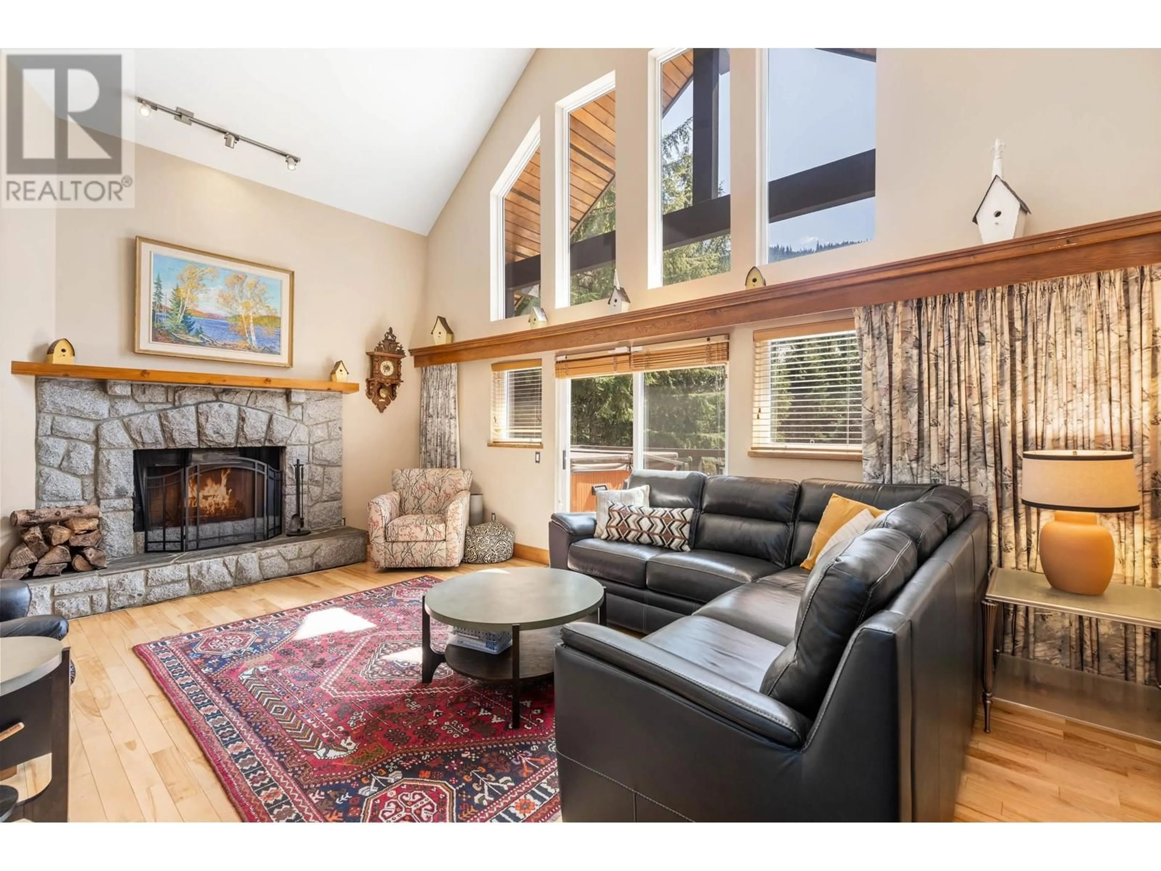 Living room with furniture, wood/laminate floor for 2405 LOS LENAS PLACE, Whistler British Columbia V8E0N2