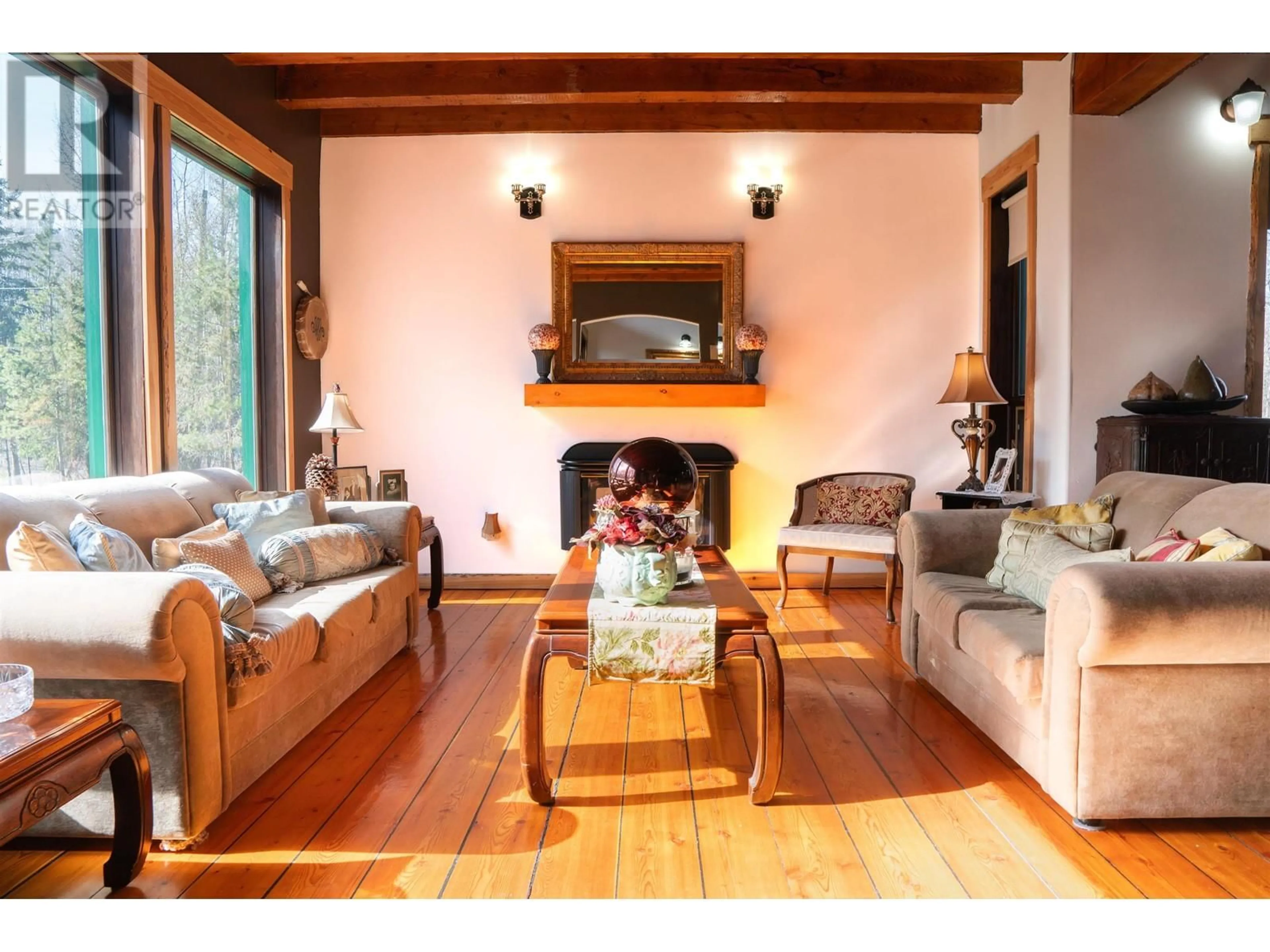 Living room with furniture, wood/laminate floor for 1428 SWEDER ROAD, Fort St. James British Columbia V0J1P0