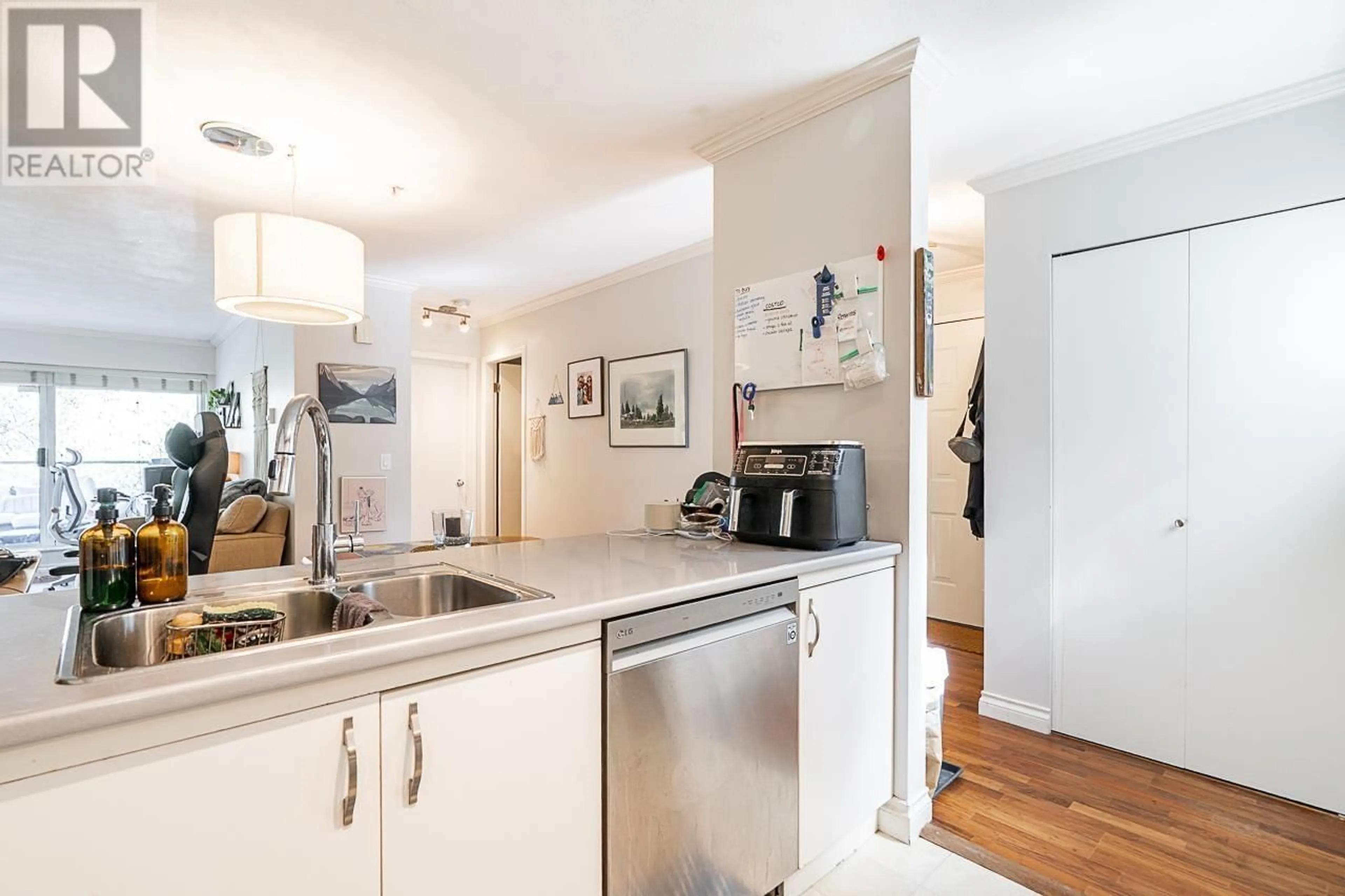 Open concept kitchen, unknown for 203 - 2250 3RD AVENUE, Vancouver British Columbia V6K1L4