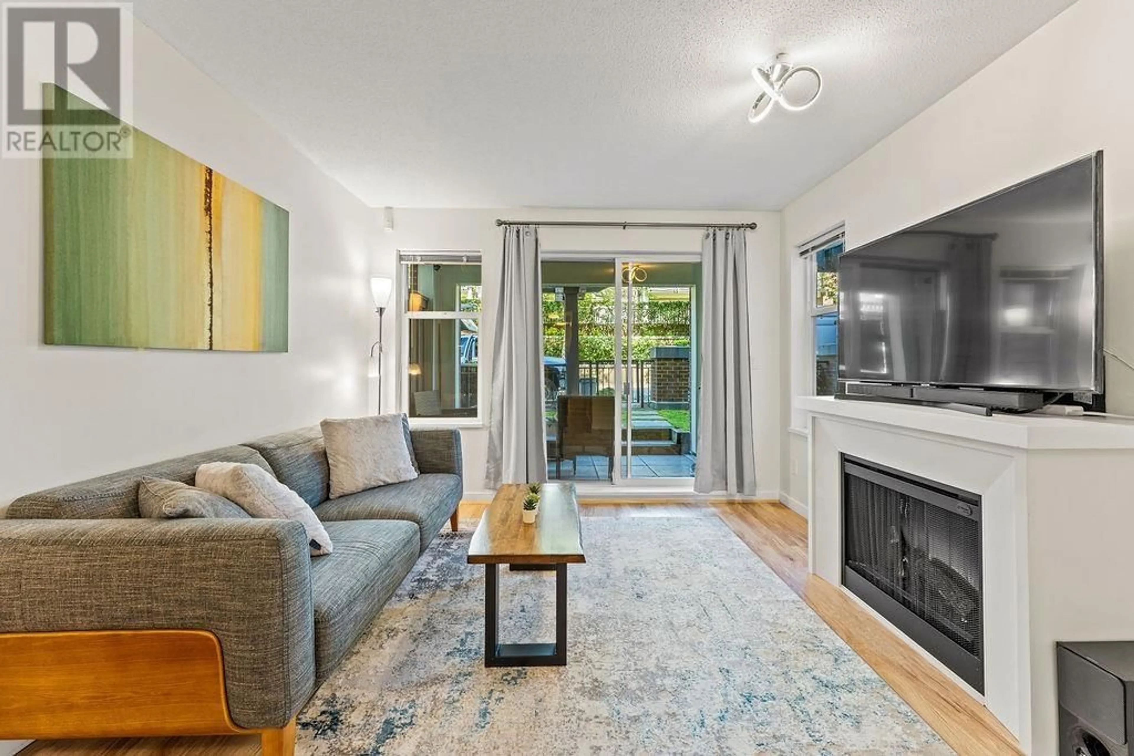 Living room with furniture, unknown for 109 - 4868 BRENTWOOD DRIVE, Burnaby British Columbia V5C0C2