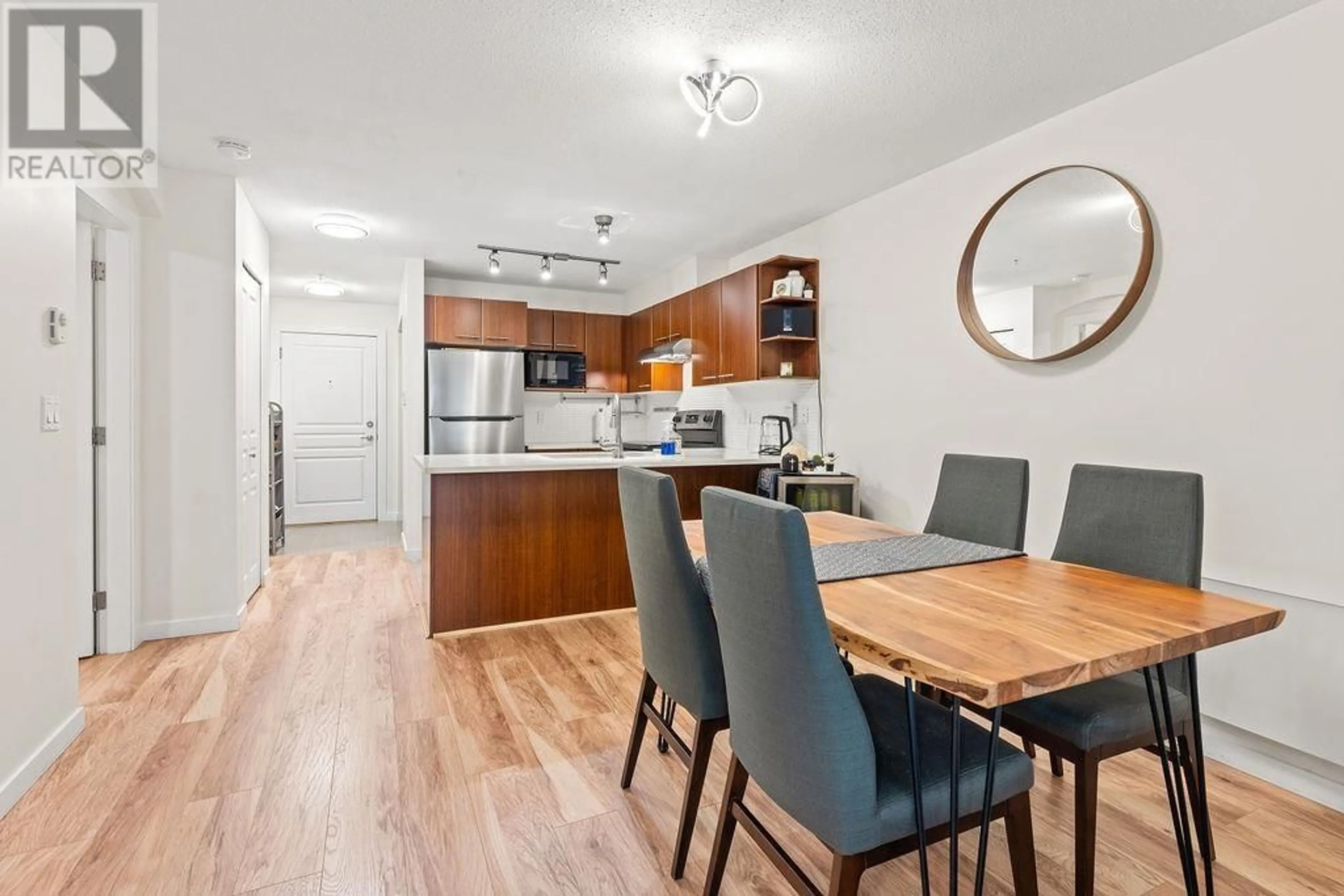 Open concept kitchen, wood/laminate floor for 109 - 4868 BRENTWOOD DRIVE, Burnaby British Columbia V5C0C2