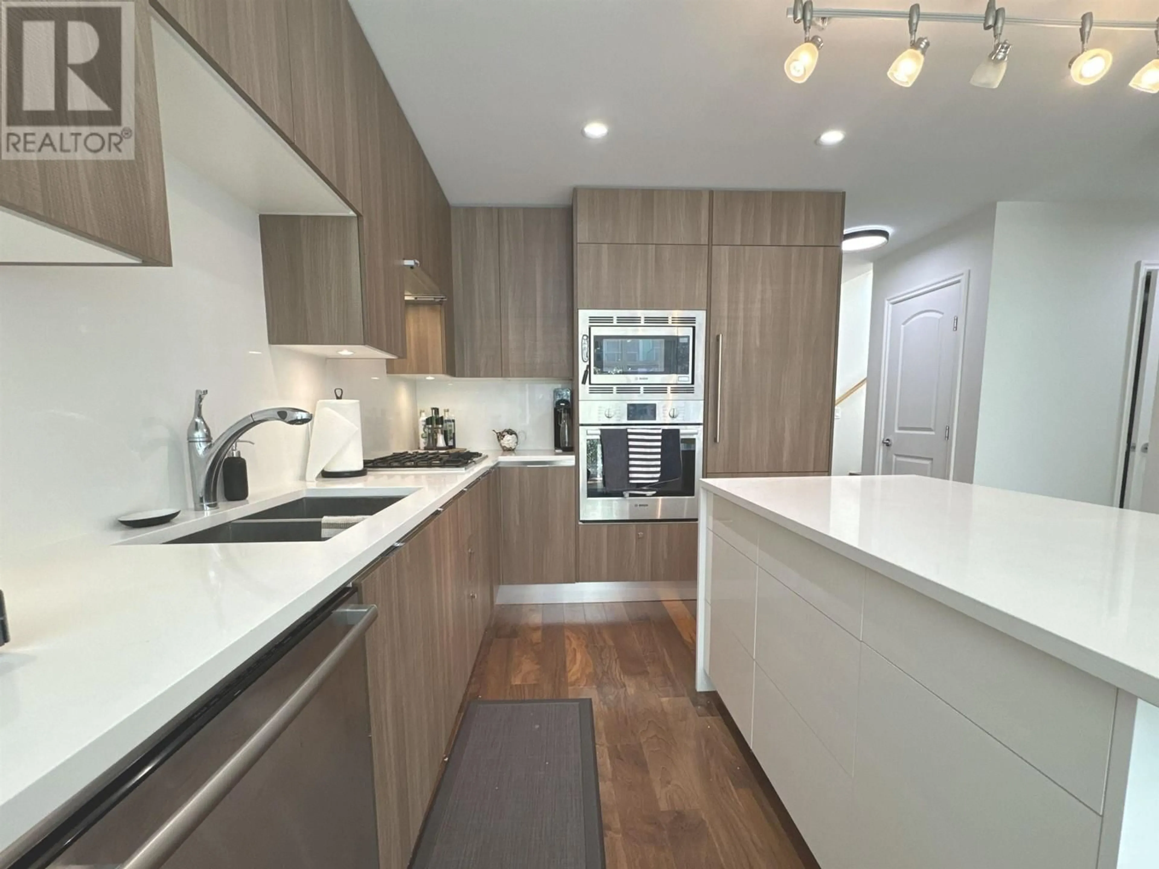 Contemporary kitchen, unknown for 202 - 185 VICTORY SHIP WAY, Vancouver British Columbia V7L0G2