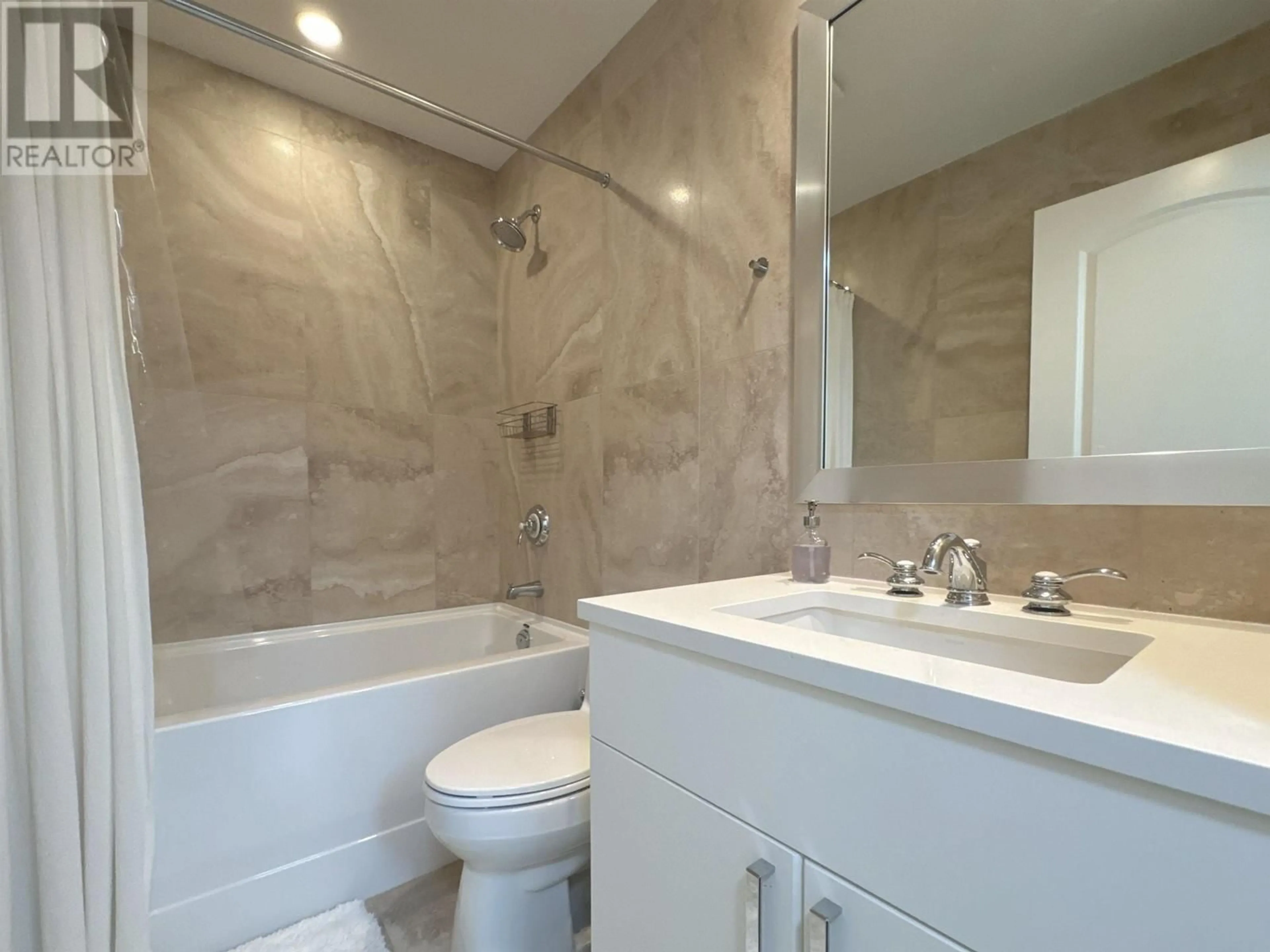 Standard bathroom, ceramic/tile floor for 202 - 185 VICTORY SHIP WAY, Vancouver British Columbia V7L0G2