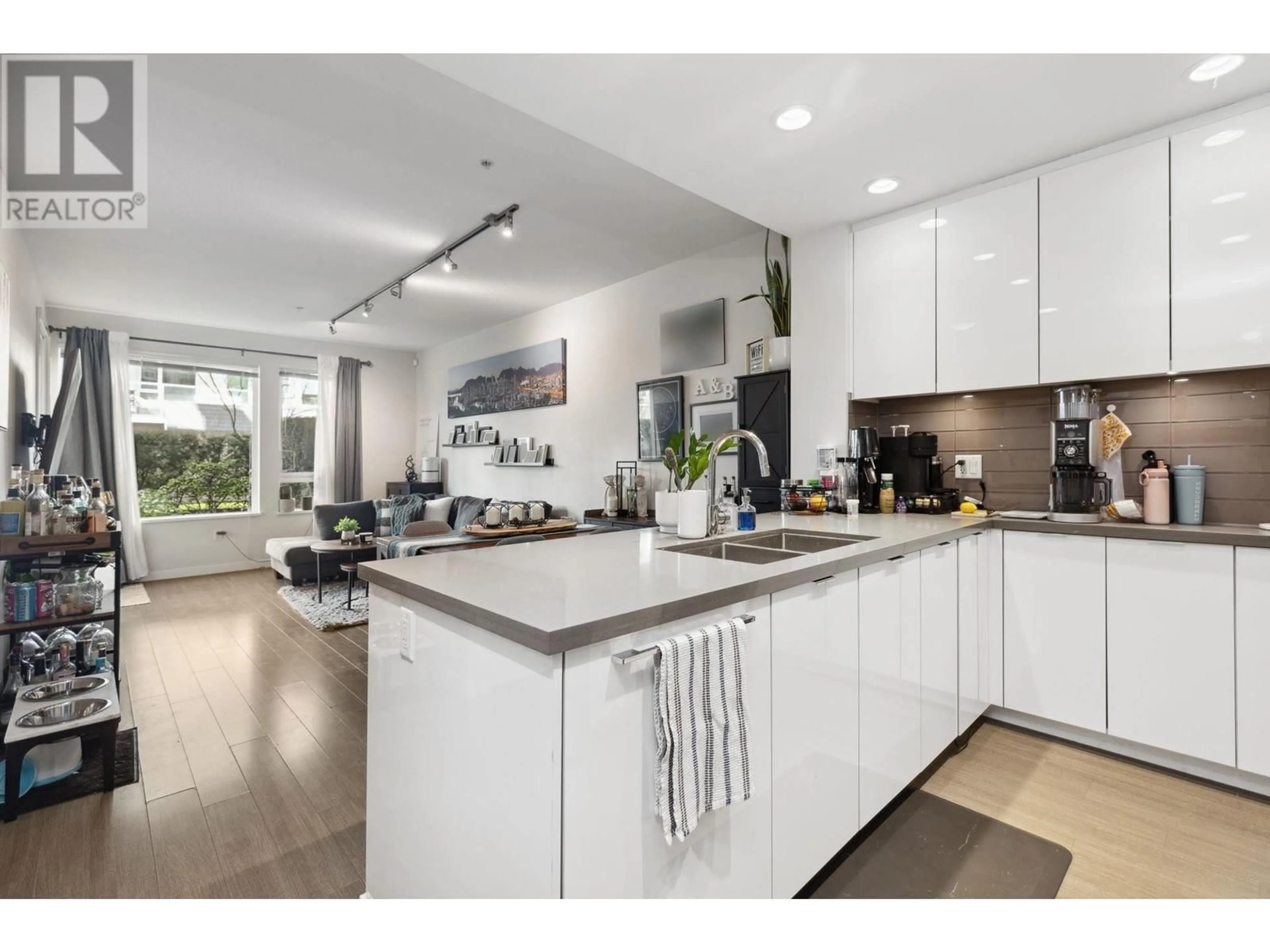 Open concept kitchen, ceramic/tile floor for 111 - 255 1ST STREET, North Vancouver British Columbia V7M3G8