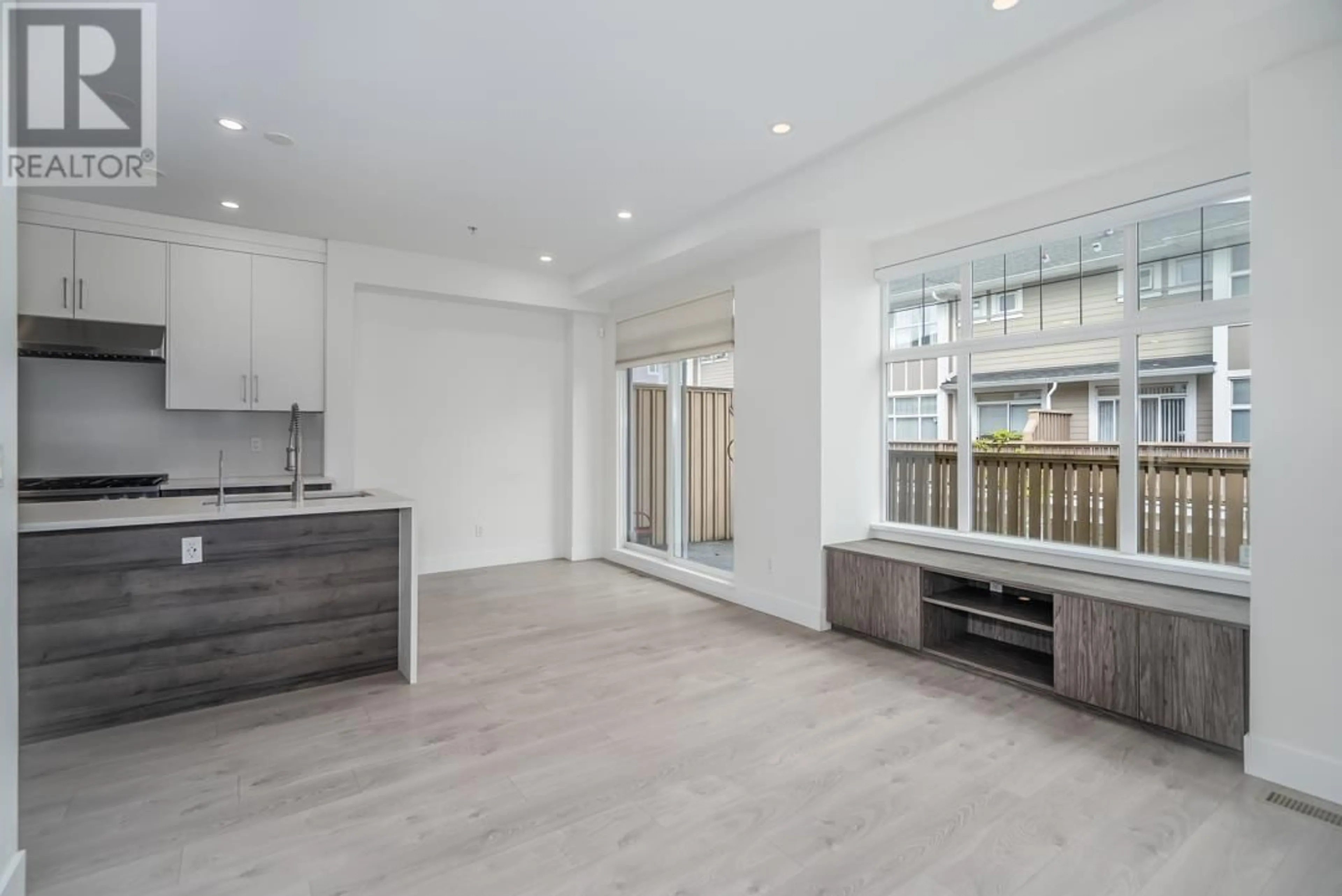 Open concept kitchen, wood/laminate floor for 961 59TH AVENUE, Vancouver British Columbia V6P1X8