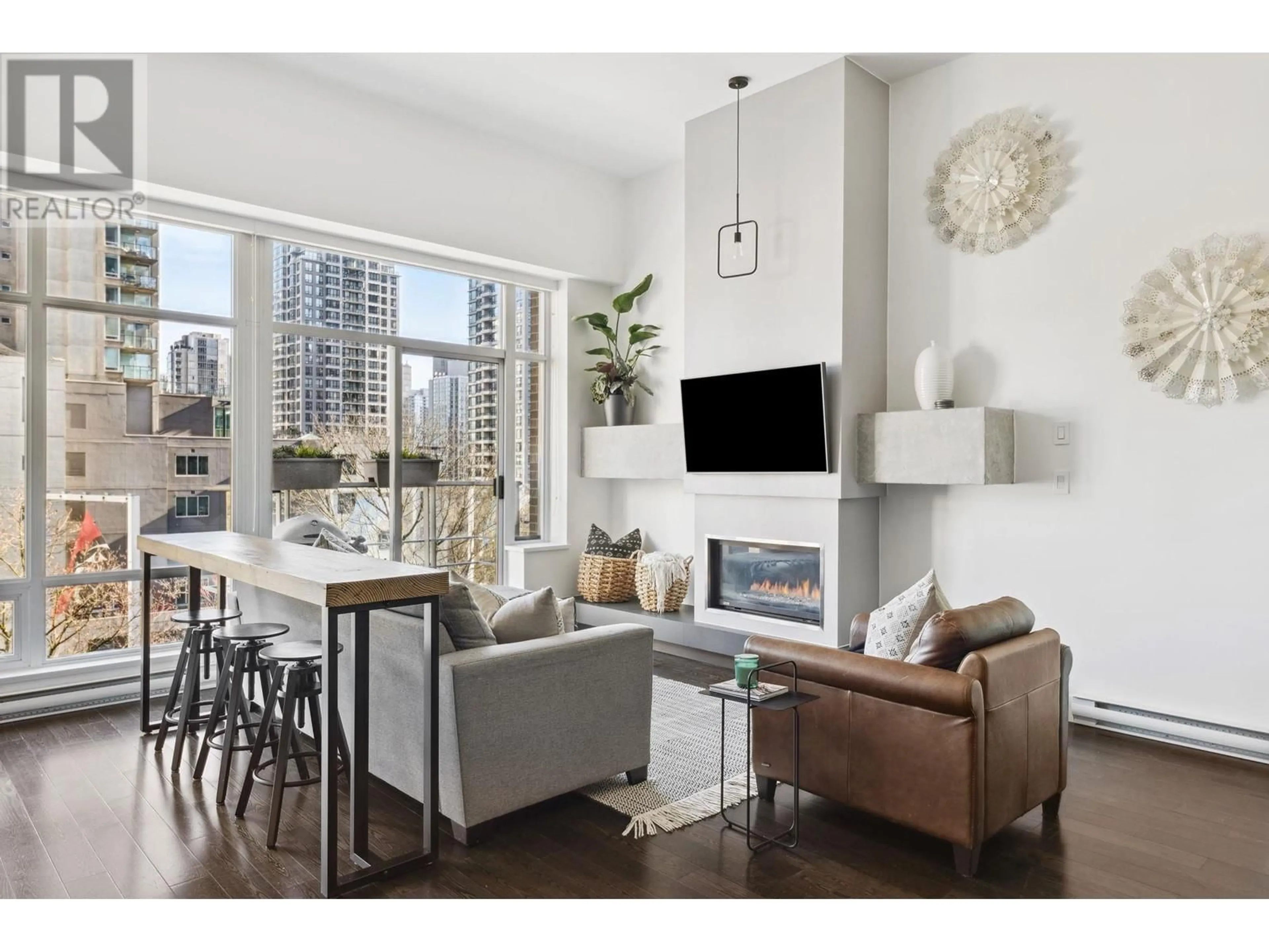 Living room with furniture, wood/laminate floor for 403 - 535 SMITHE STREET, Vancouver British Columbia V6B0H2