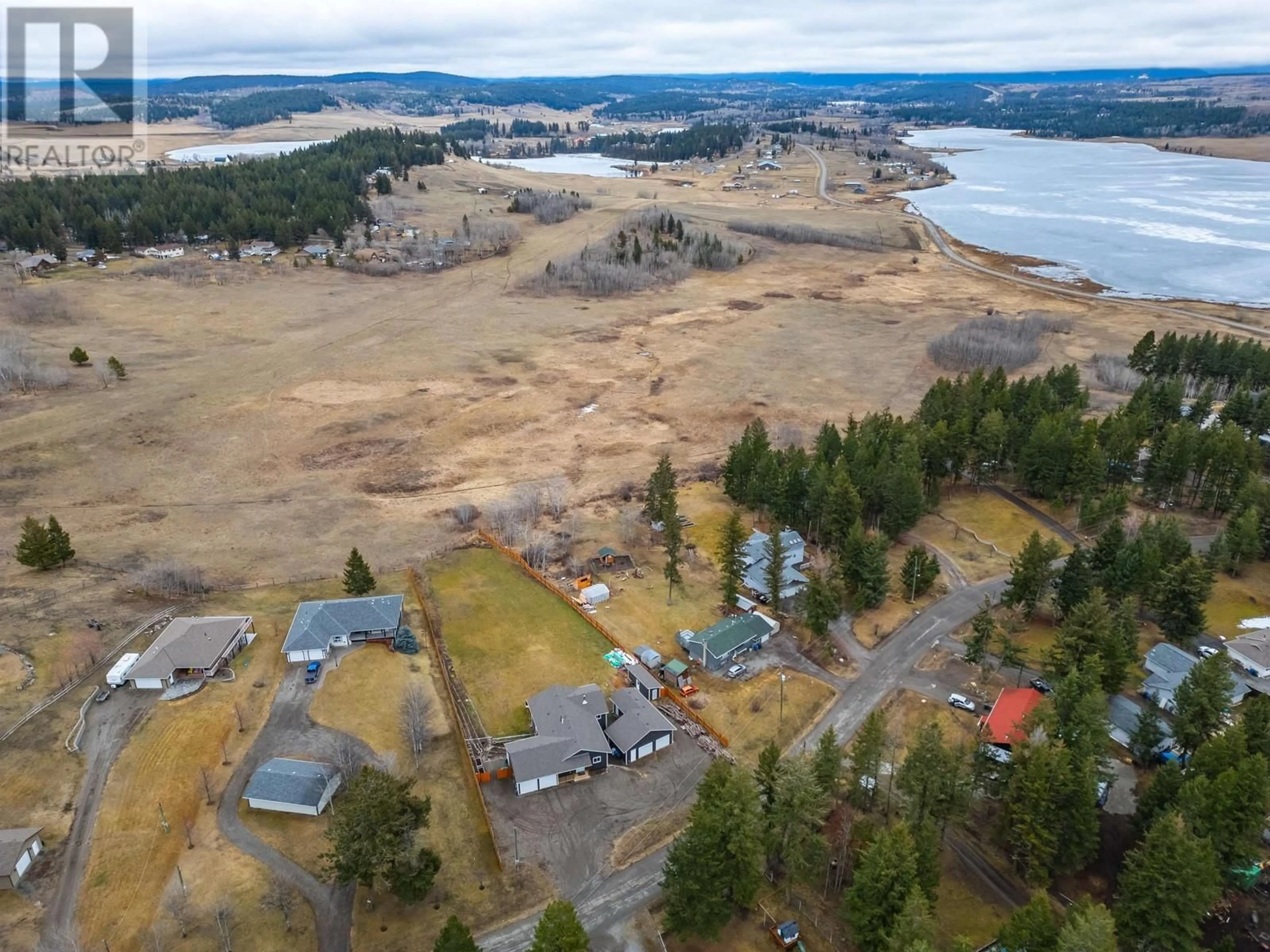 A pic from outside/outdoor area/front of a property/back of a property/a pic from drone, water/lake/river/ocean view for 5066 BLOCK DRIVE, 108 Mile Ranch British Columbia V0K2E0