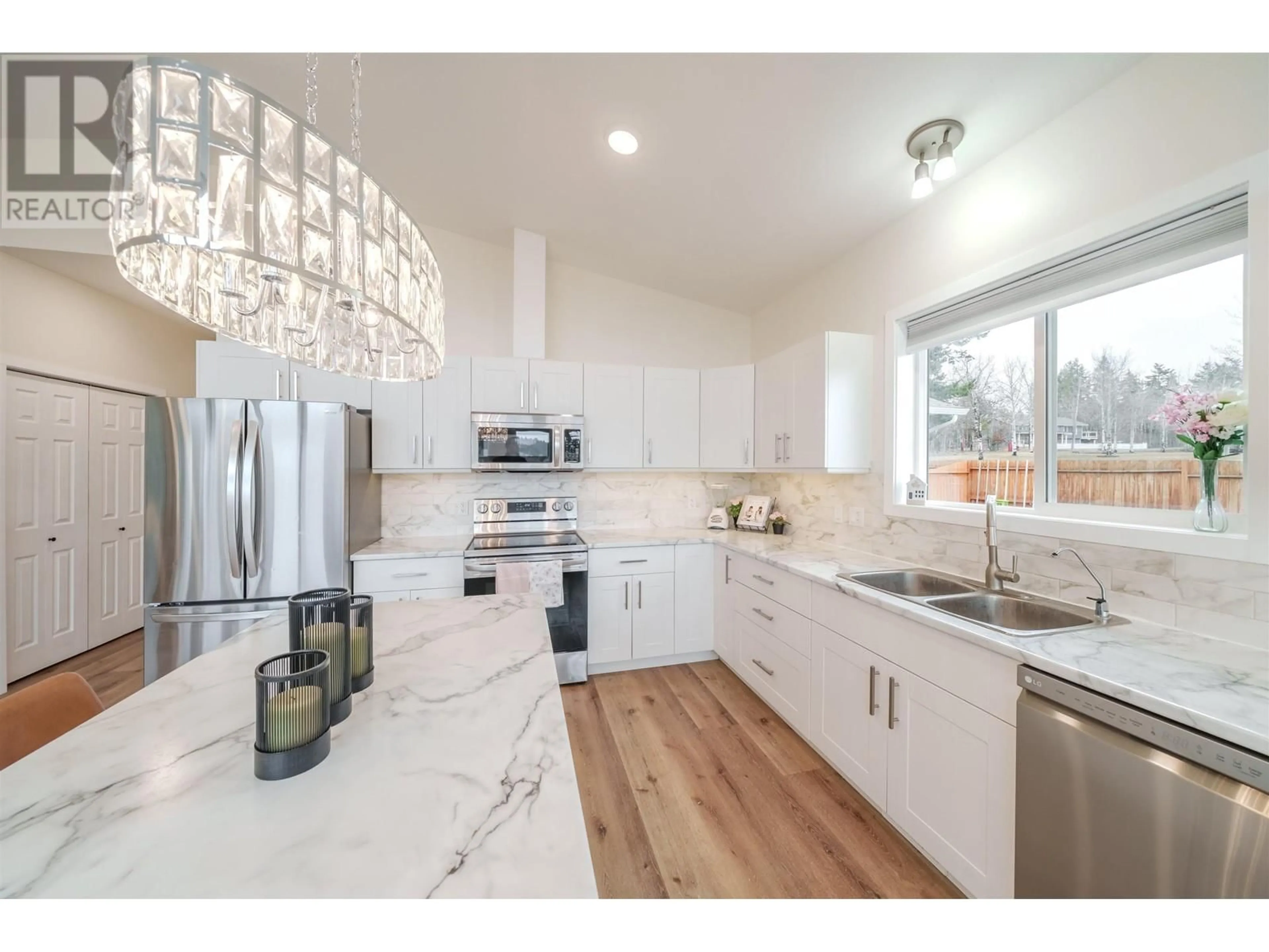 Open concept kitchen, ceramic/tile floor for 5066 BLOCK DRIVE, 108 Mile Ranch British Columbia V0K2E0