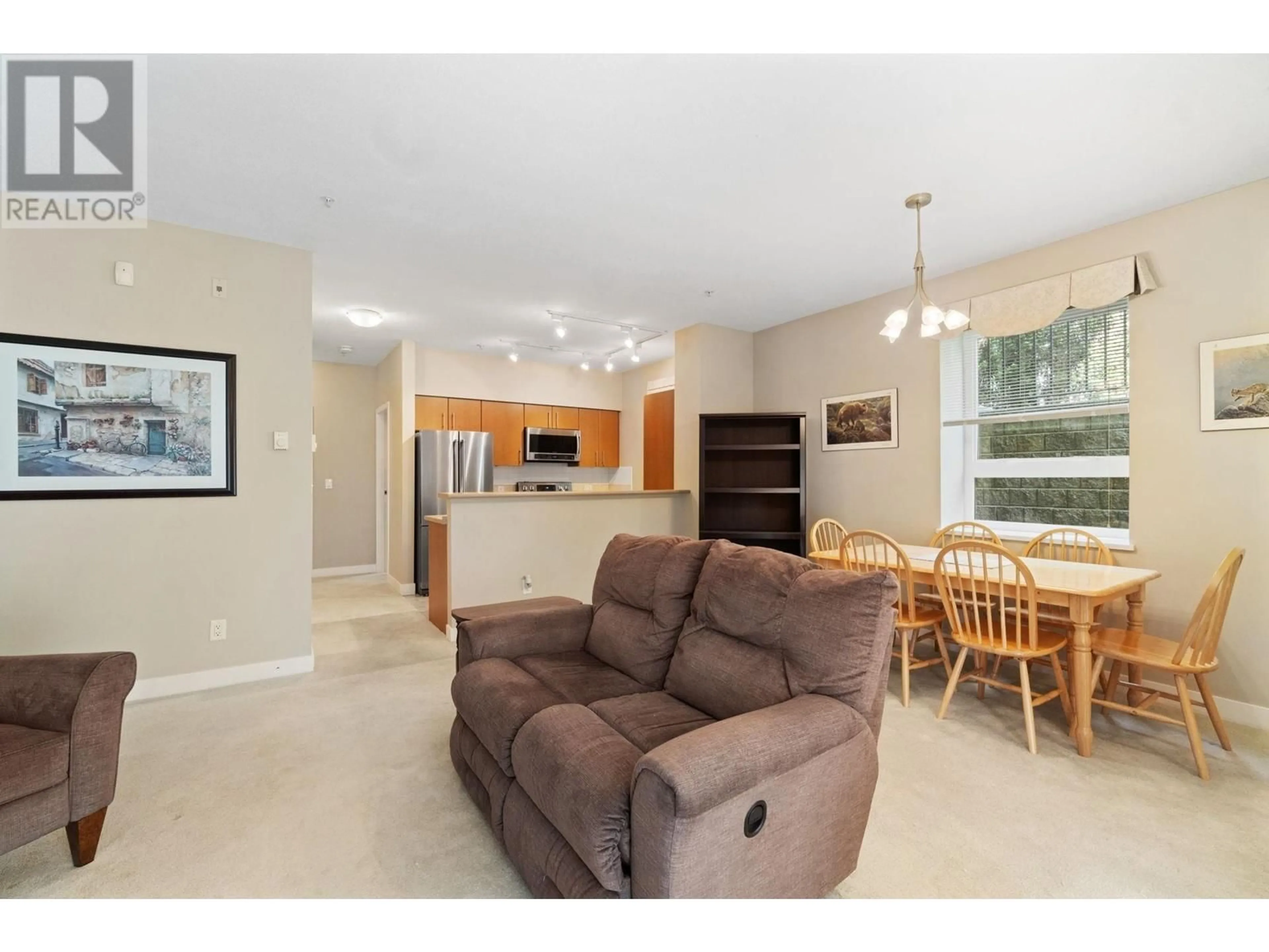 Living room with furniture, unknown for 7032 MONT ROYAL SQUARE, Vancouver British Columbia V5S4X5