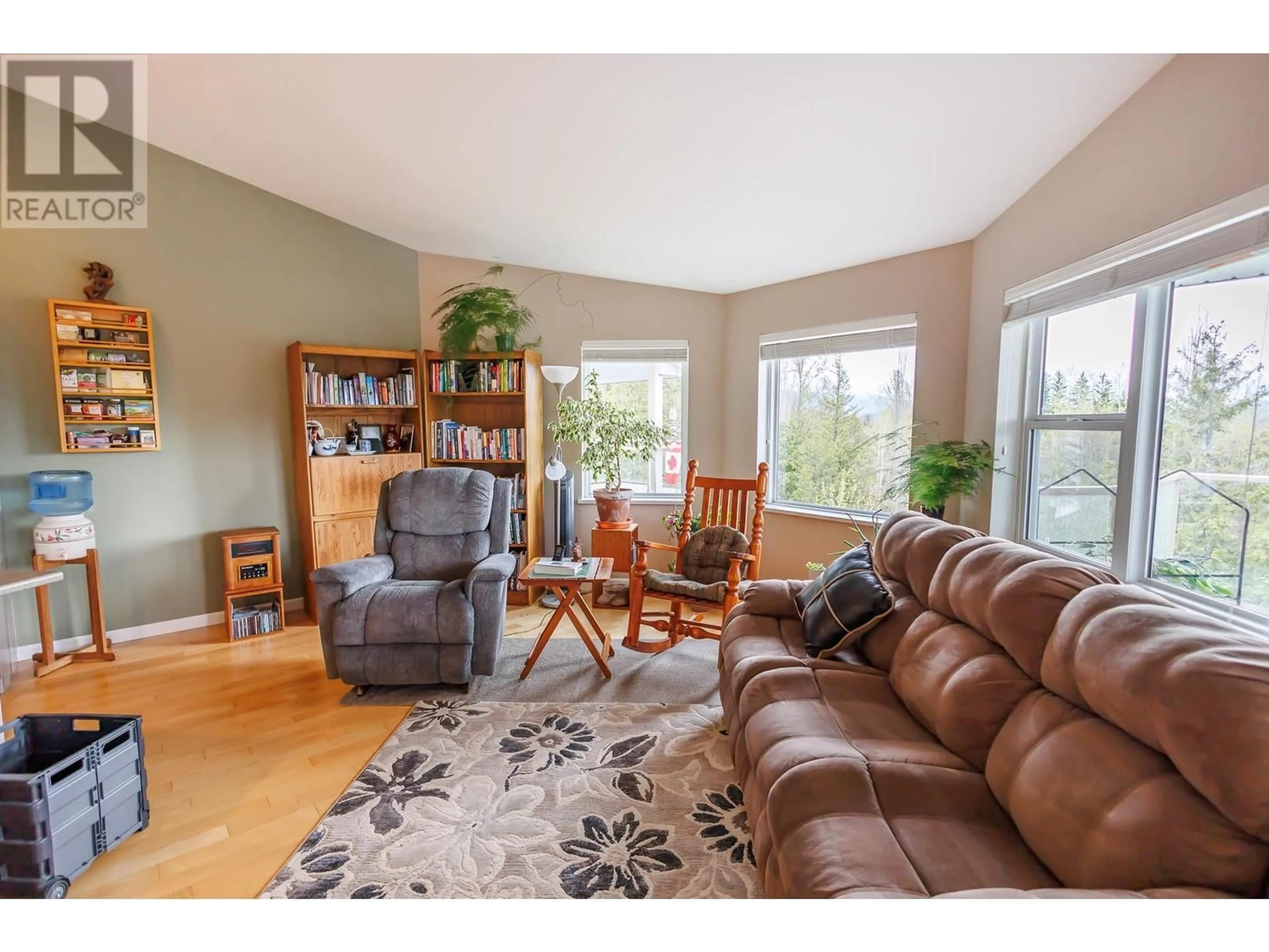 Living room with furniture, wood/laminate floor for 3 - 4022 YEO STREET, Terrace British Columbia V8G0H5