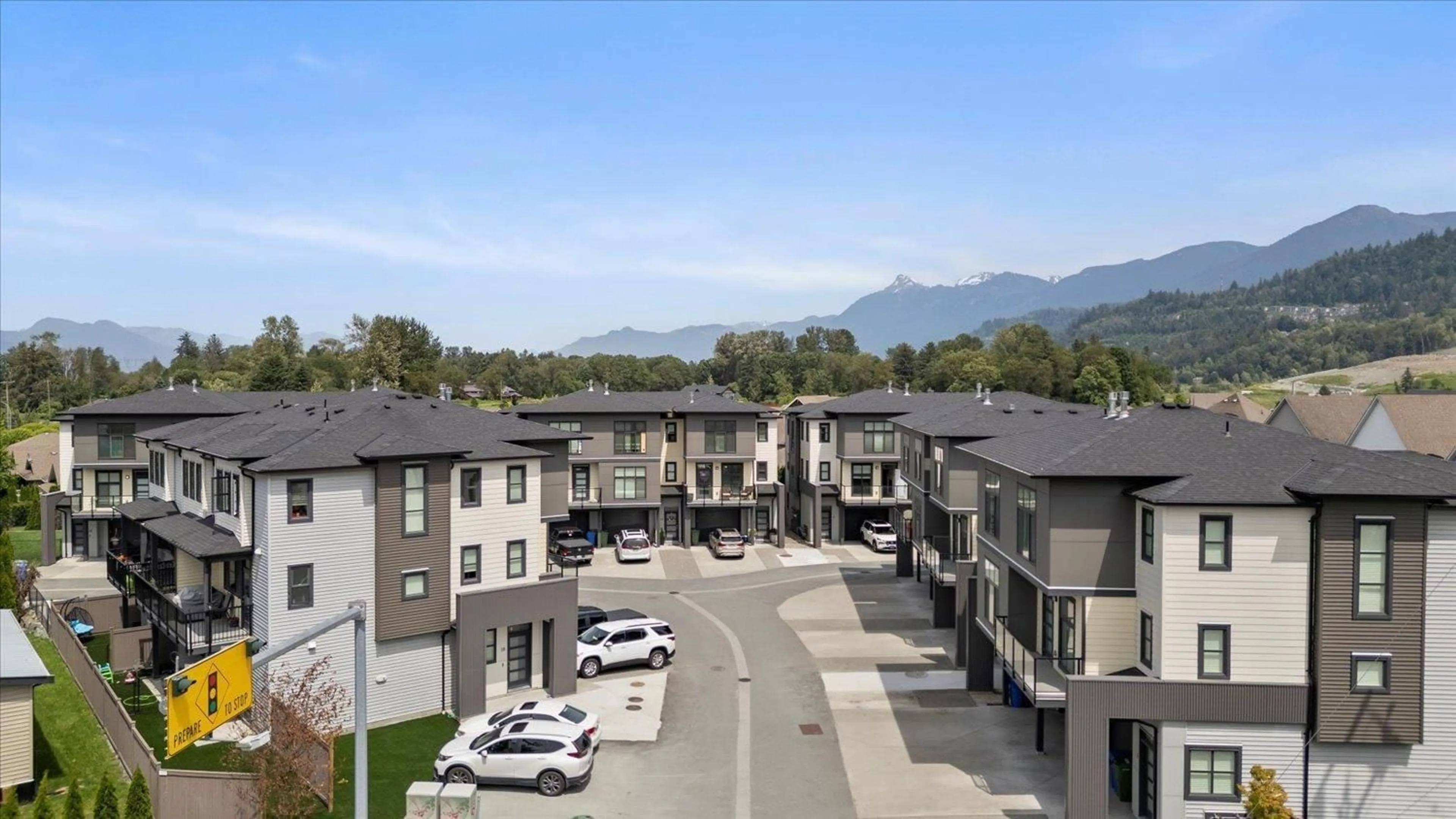 A pic from outside/outdoor area/front of a property/back of a property/a pic from drone, mountain view for 7 - 6029 PROMONTORY ROAD, Chilliwack British Columbia V2R6B1