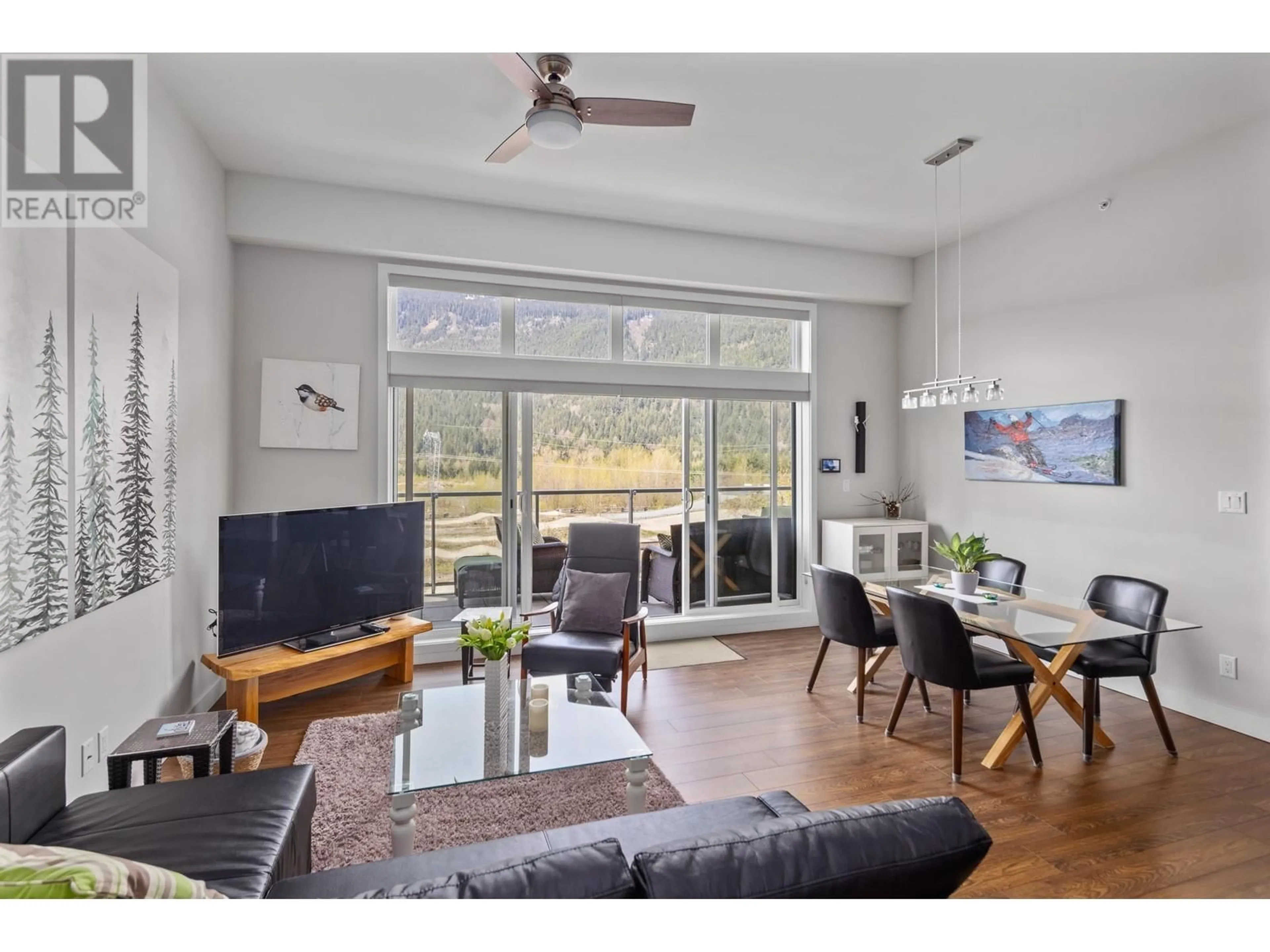 Living room with furniture, wood/laminate floor for 306 - 1025 LEGACY WAY, Whistler British Columbia V8E0S2