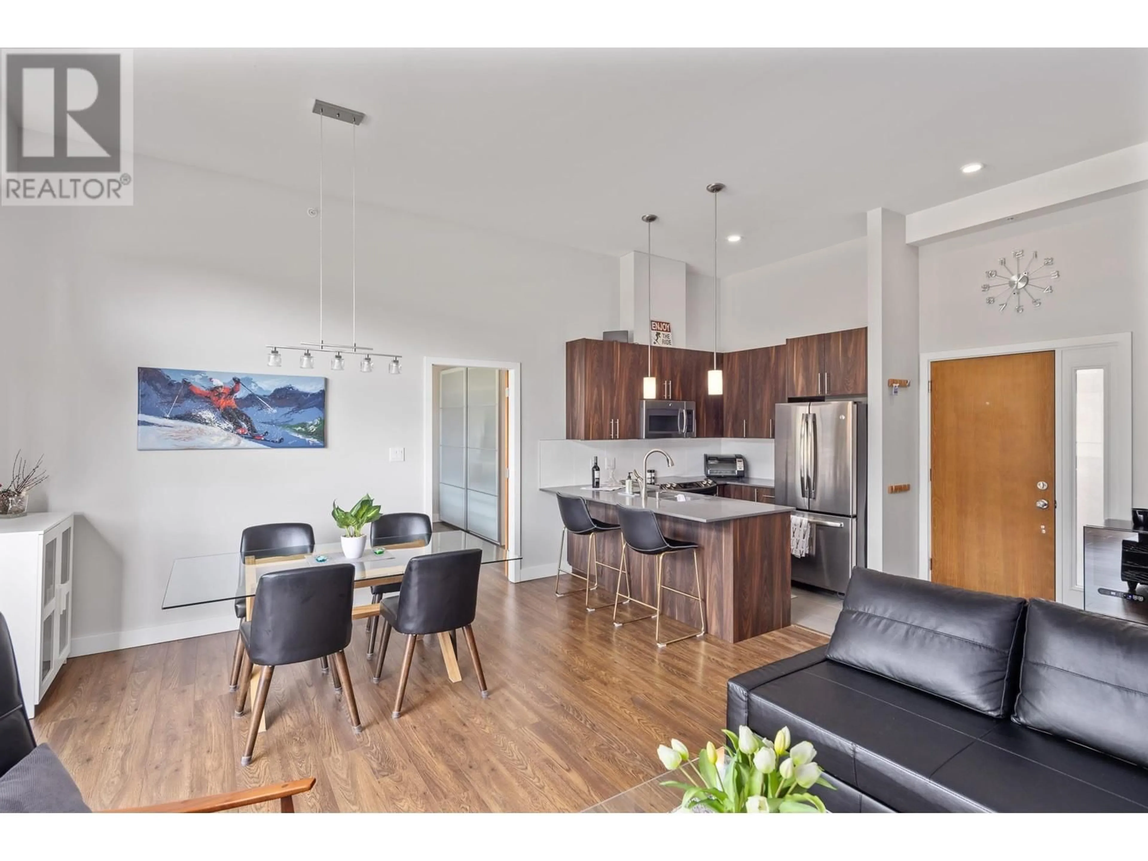 Open concept kitchen, wood/laminate floor for 306 - 1025 LEGACY WAY, Whistler British Columbia V8E0S2