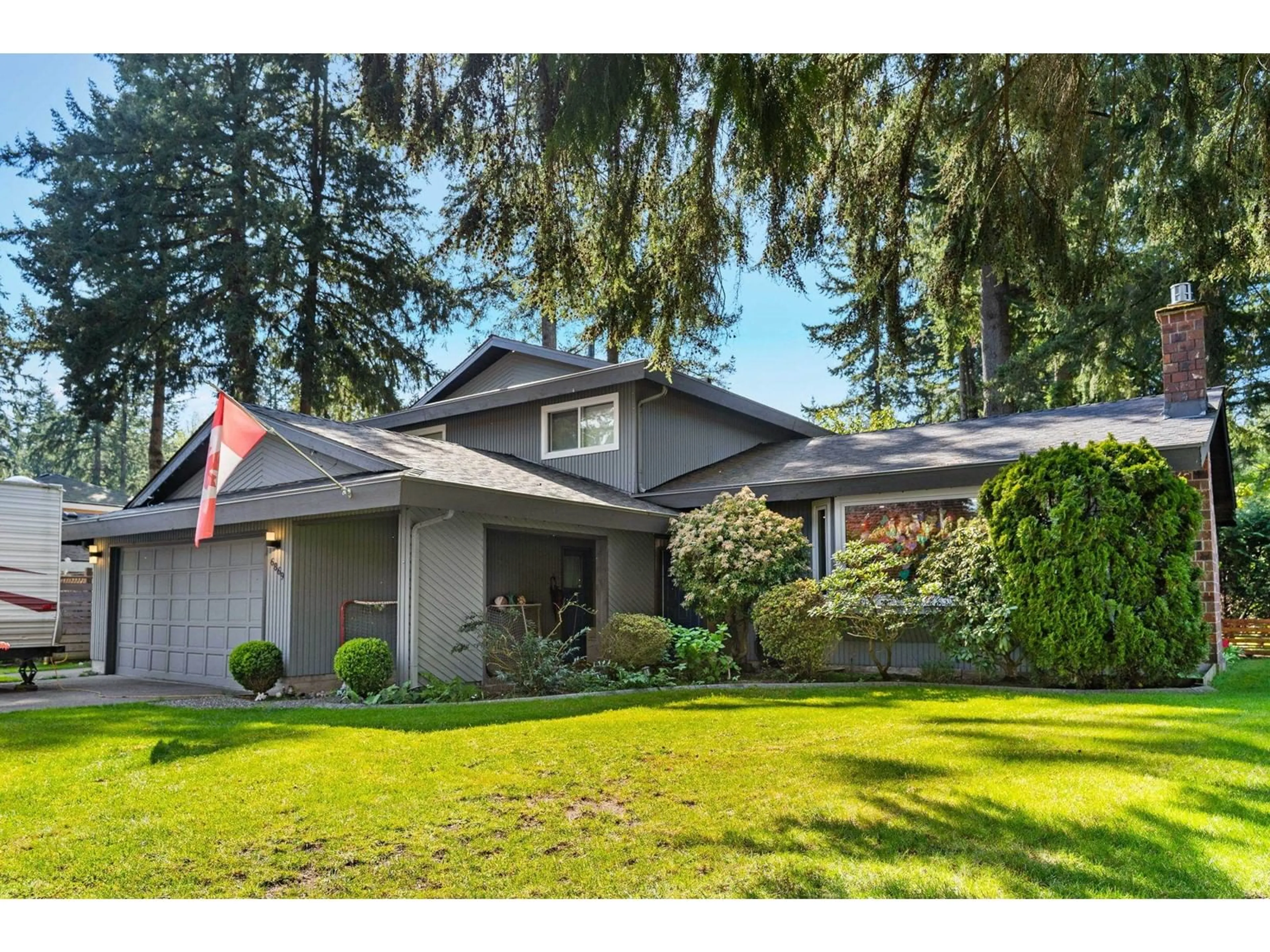 Home with vinyl exterior material, street for 6869 STEWART, Delta British Columbia V4E2J4