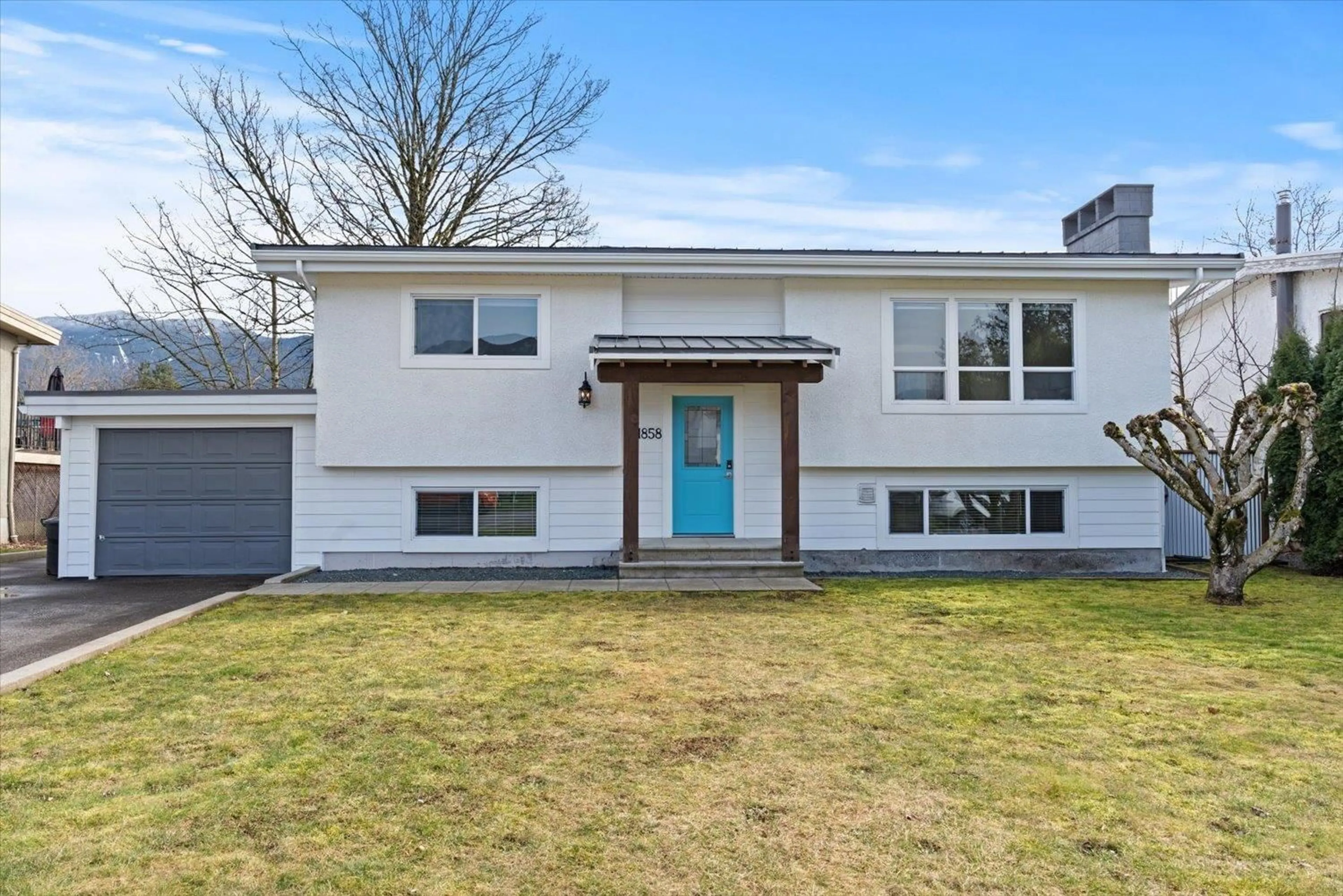 Home with vinyl exterior material, street for 1858 CAROLINE DRIVE, Agassiz British Columbia V0M1A3