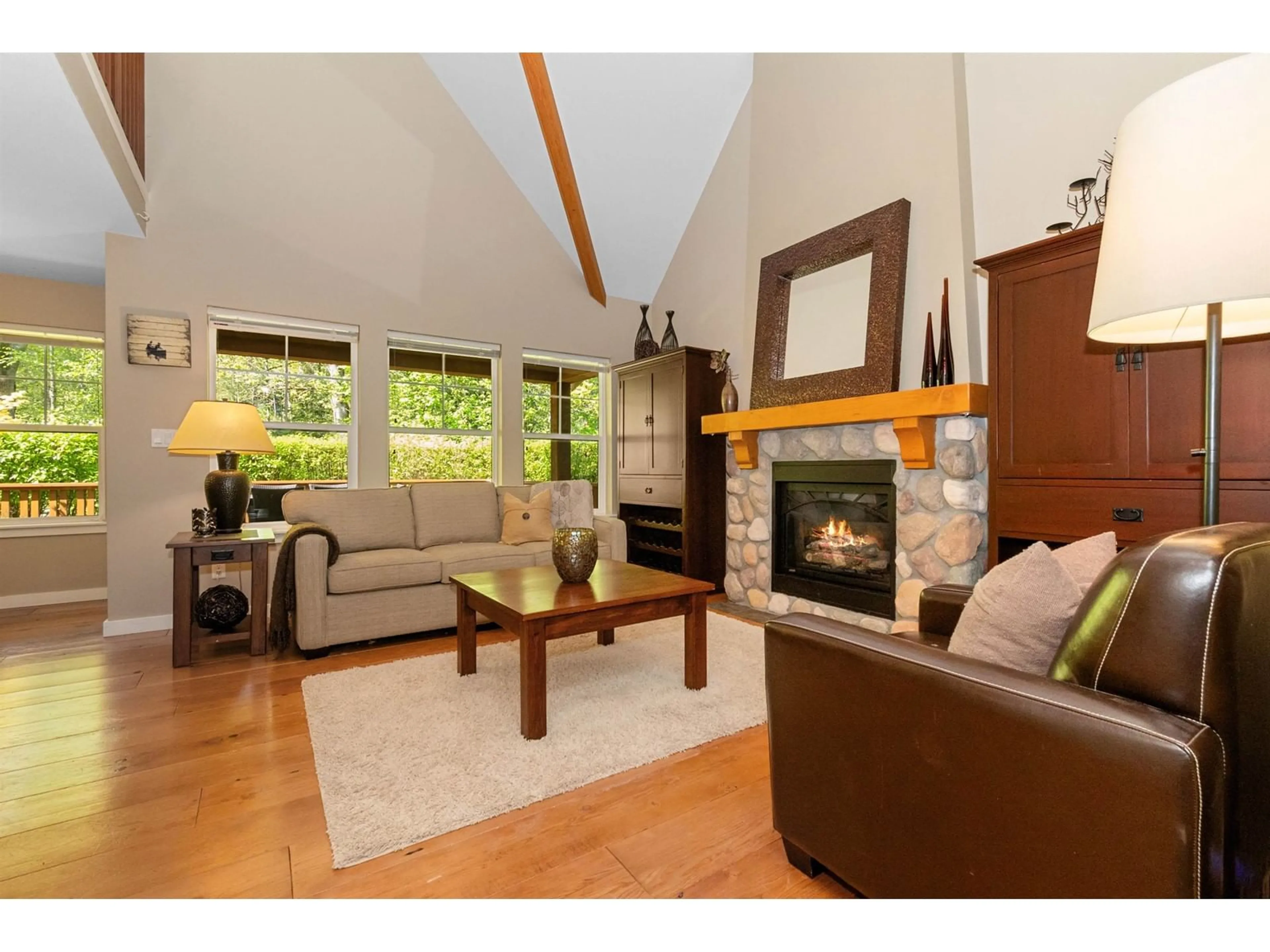 Living room with furniture, wood/laminate floor for 1869 BLACKBERRY LANE, Lindell Beach British Columbia V2R0E1