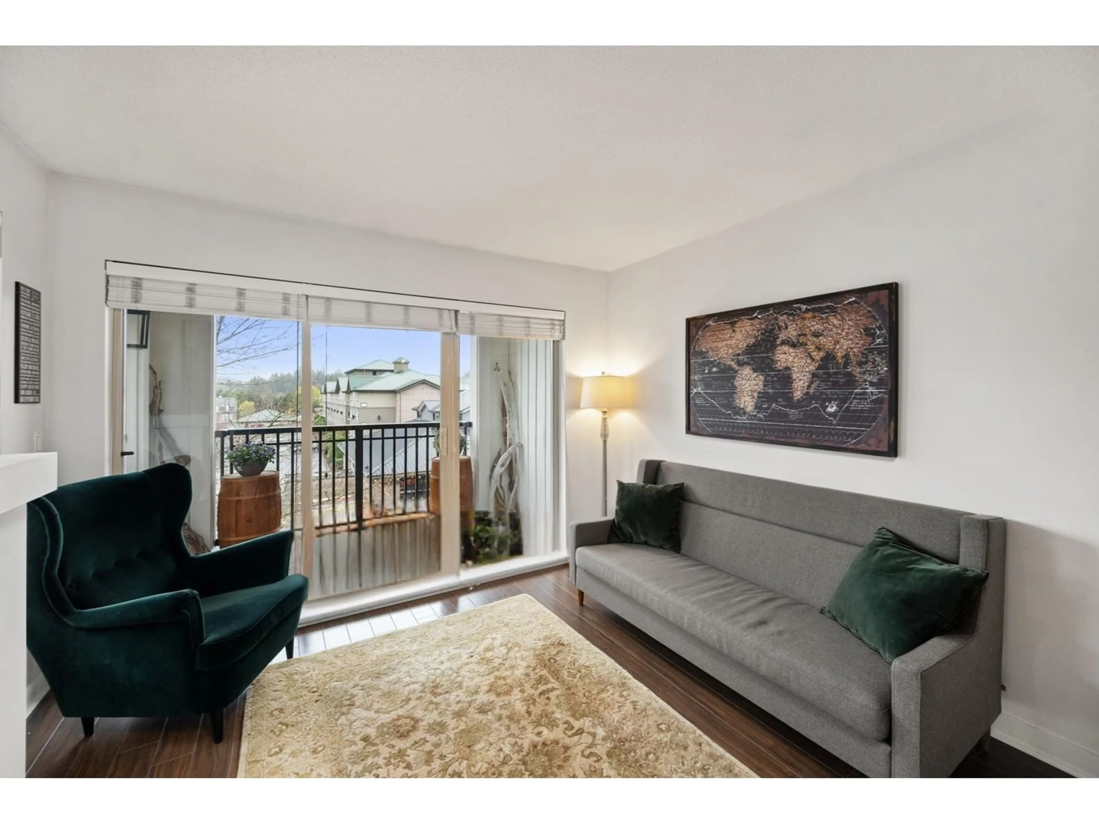 Living room with furniture, wood/laminate floor for A412 - 8929 202, Langley British Columbia V1M0B4