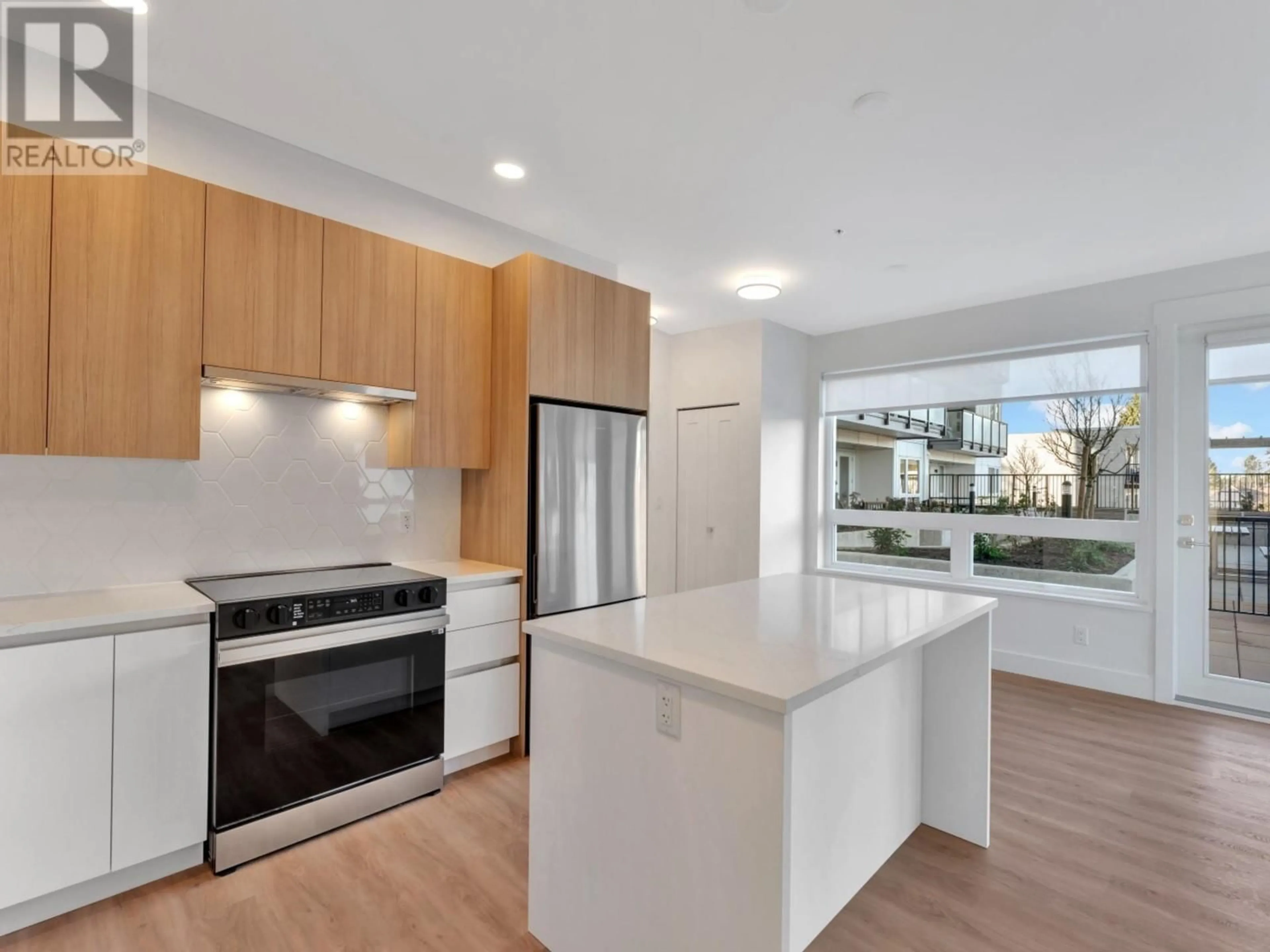 Open concept kitchen, unknown for 201 - 11907 223 STREET, Maple Ridge British Columbia V2X4P9