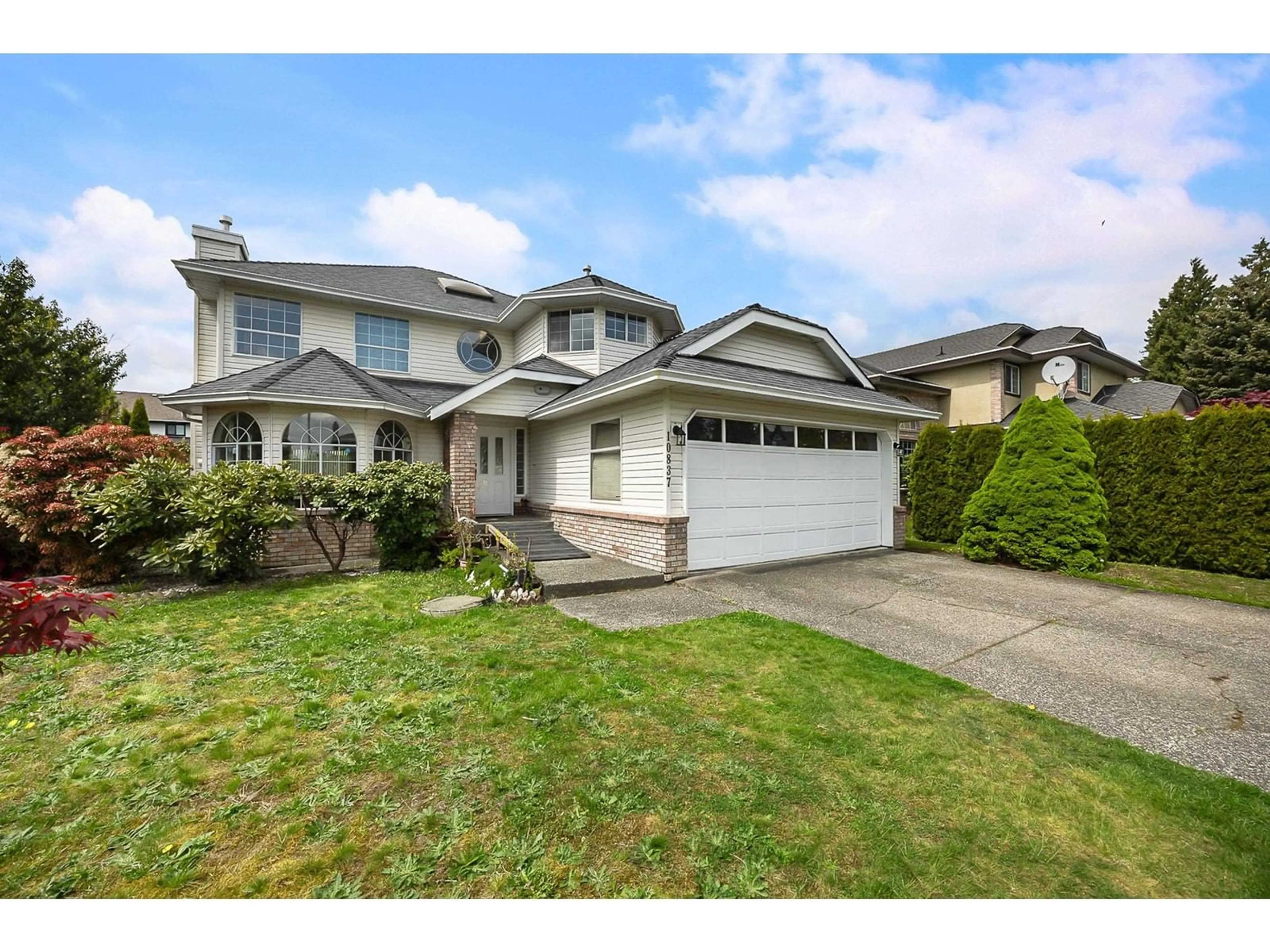 Home with vinyl exterior material, street for 10837 155A, Surrey British Columbia V3R0H7
