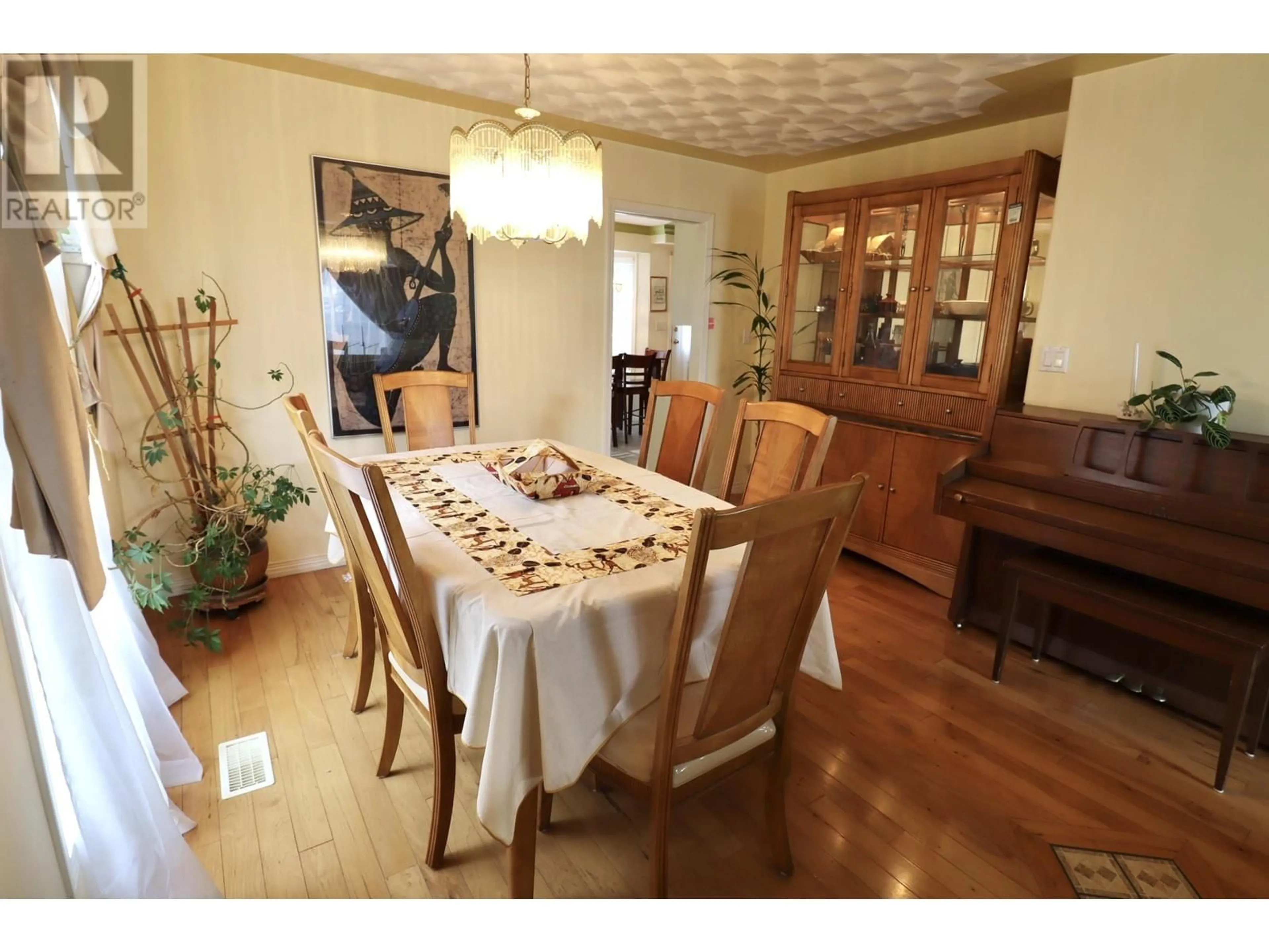 Dining room, wood/laminate floor for 4545 STAUBLE ROAD, Prince George British Columbia V2K4W9